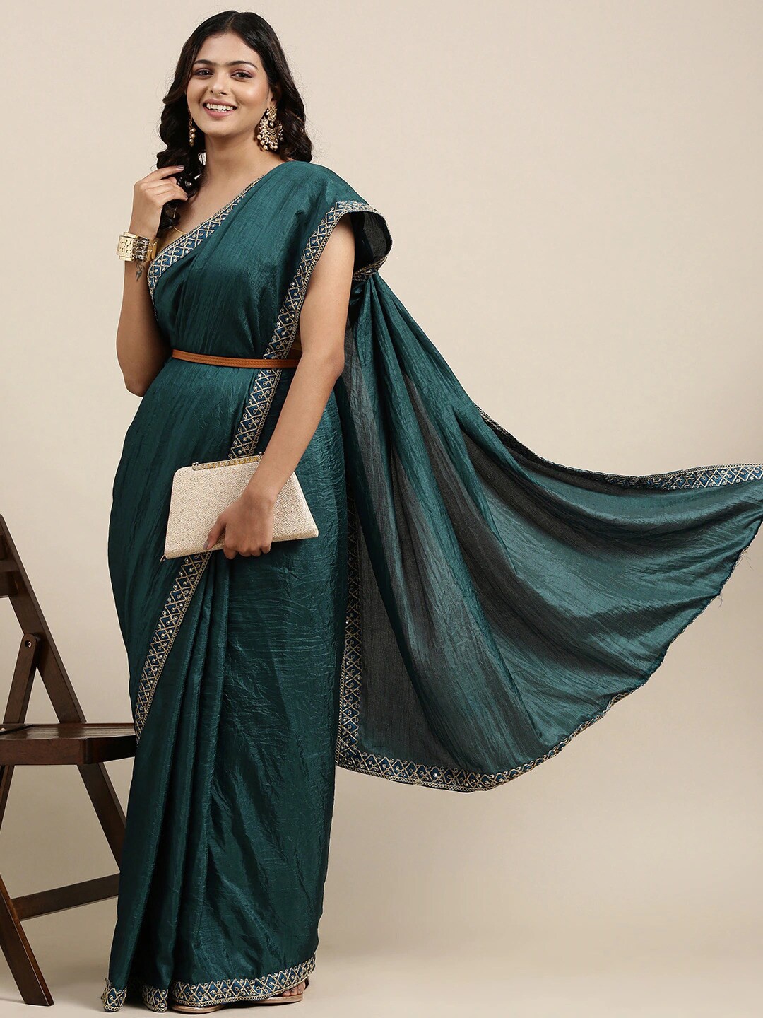 

KALINI Teal Embroidered Silk Blend Saree