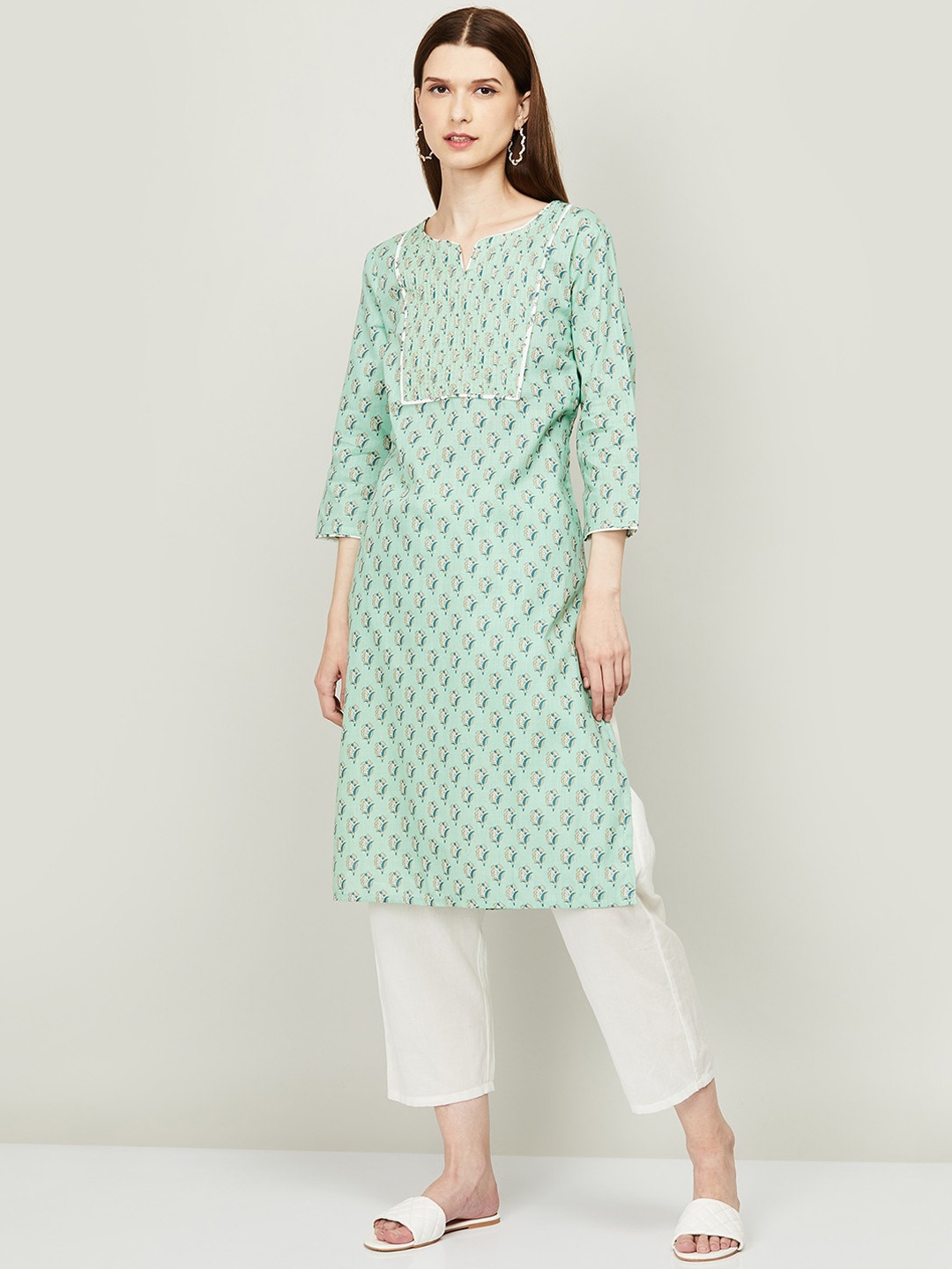 

Melange by Lifestyle Women Green Ethnic Motifs Printed Keyhole Neck Thread Work Kurta