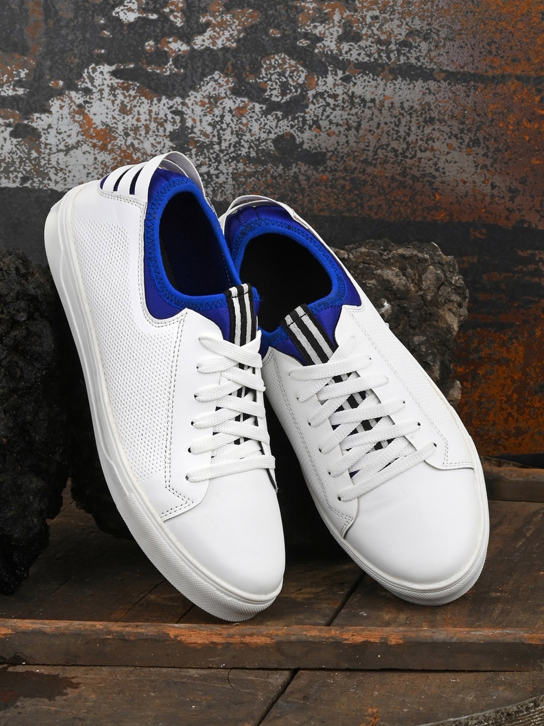 

Roadster Men Blue & Black Leather Casual Sneakers