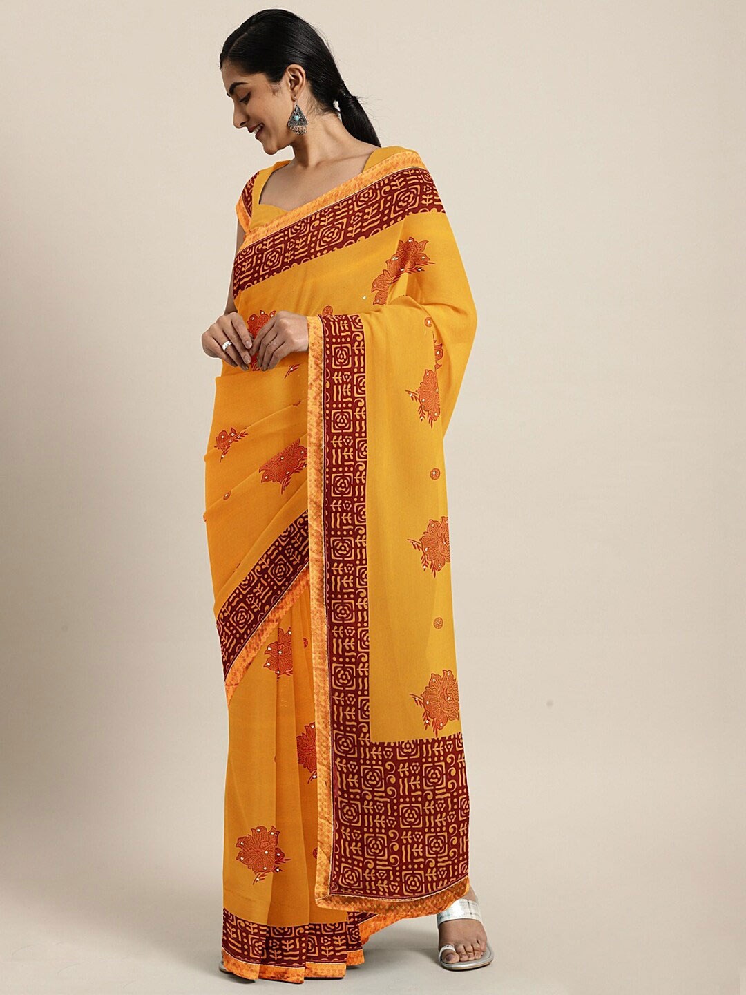 

SHAVYA Yellow & Red Embroidered Pure Georgette Saree
