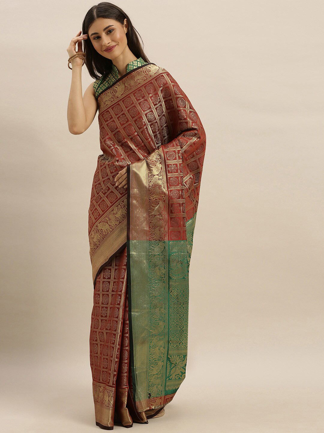 

SHAVYA Brown & Green Woven Design Zari Pure Silk Heavy Work Patola Saree
