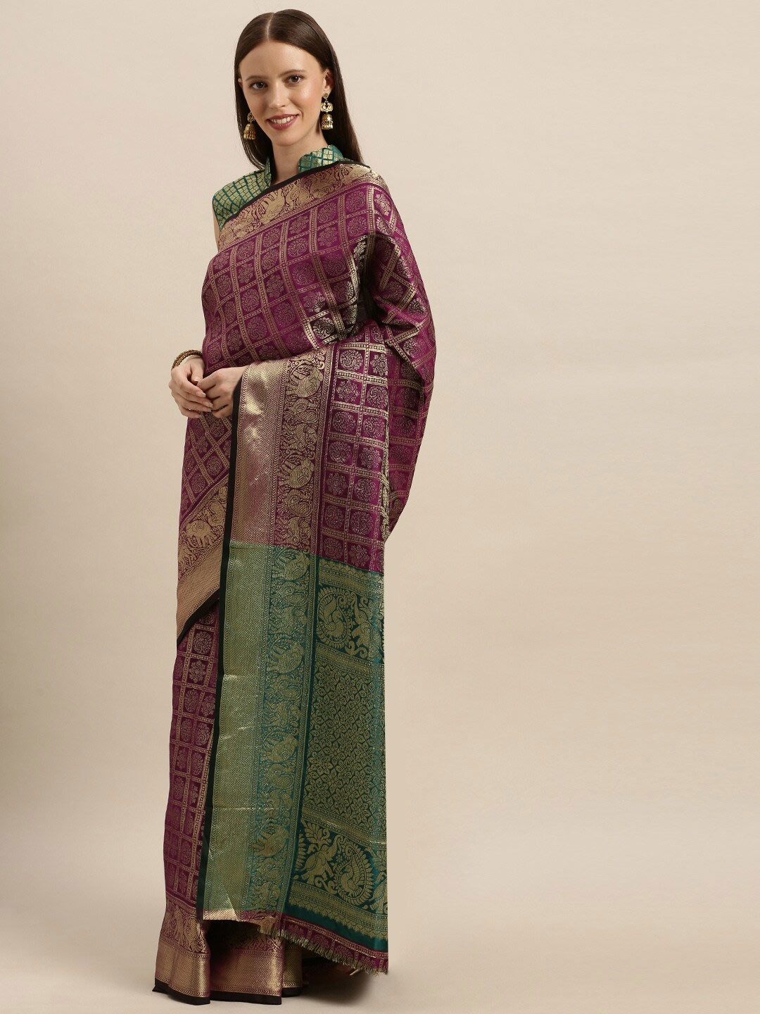 

SHAVYA Purple & Green Woven Design Zari Pure Silk Heavy Work Patola Saree