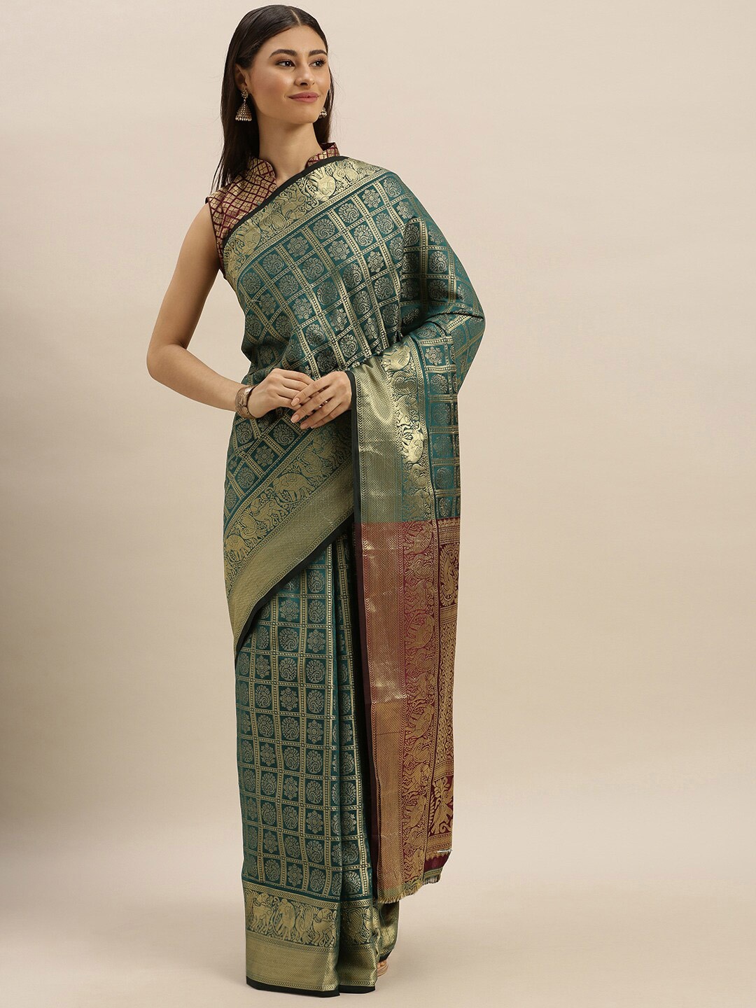 

SHAVYA Turquoise Blue & Gold-Toned Woven Design Zari Pure Silk Heavy Work Patola Saree