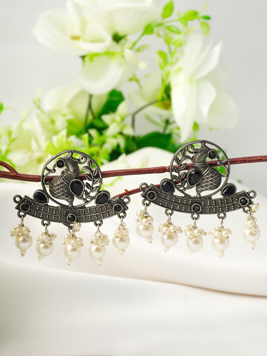 

Urmika Silver-Toned Classic Jhumkas Earrings