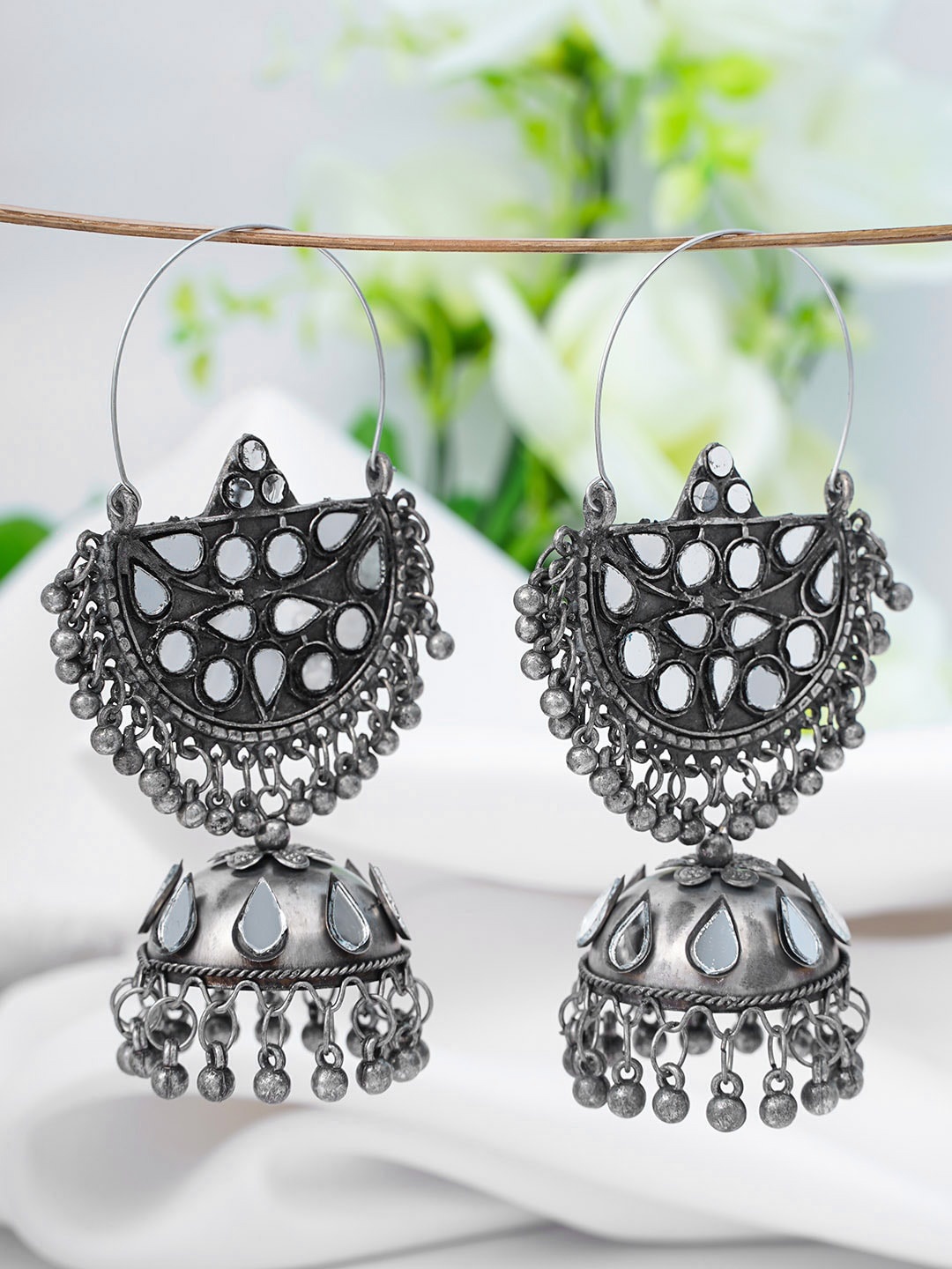 

Urmika Silver-Toned Classic Jhumkas Earrings