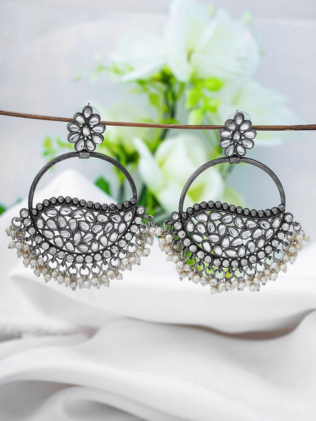 

Urmika Silver-Toned Classic Chandbalis Earrings