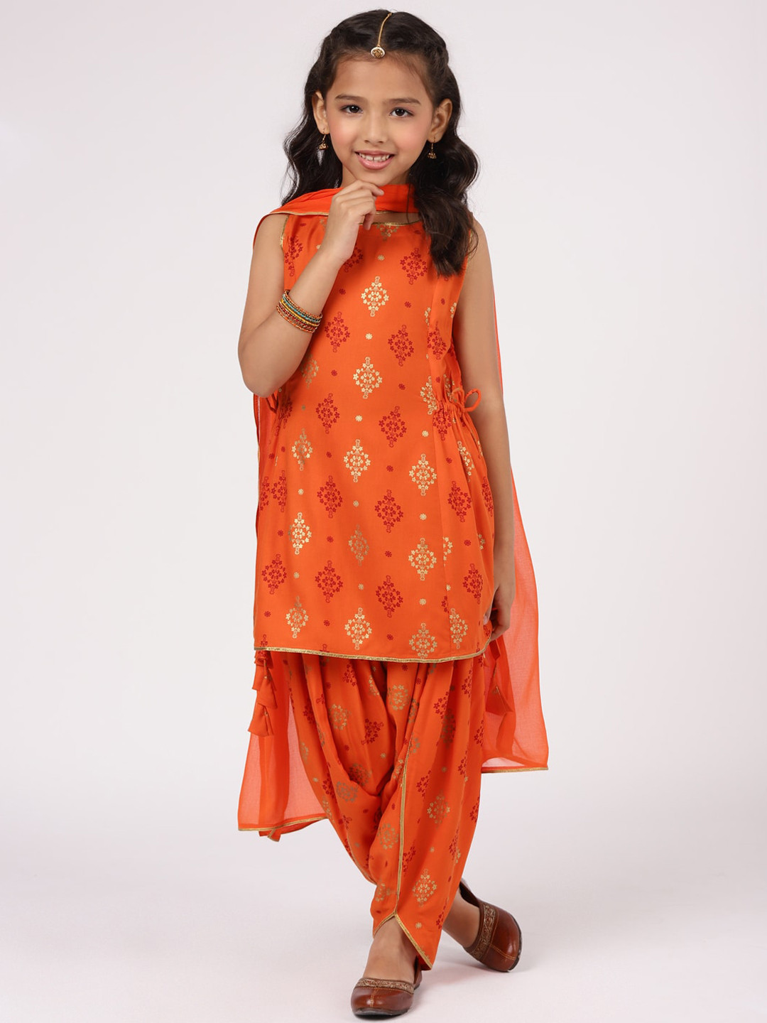 

Libas KIDS Girls Orange Ethnic Motifs Printed Gotta Patti Kurta with Dhoti Pants & With Dupatta