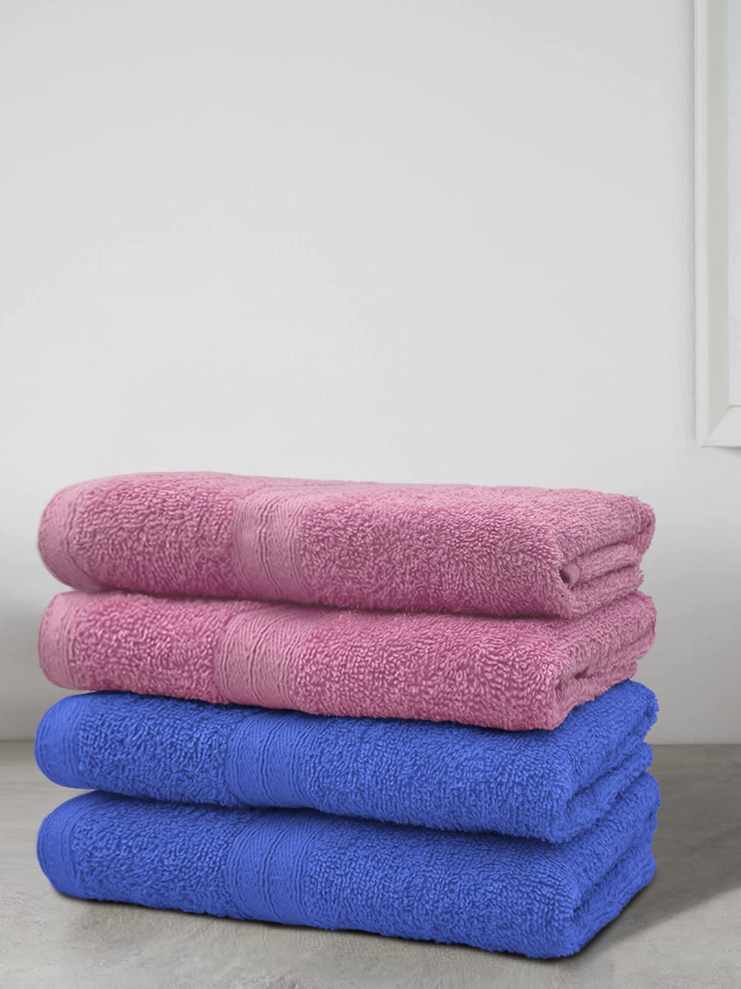 

Aura Set Of 4 Blue Solid 500 GSM Cotton Bath Towels