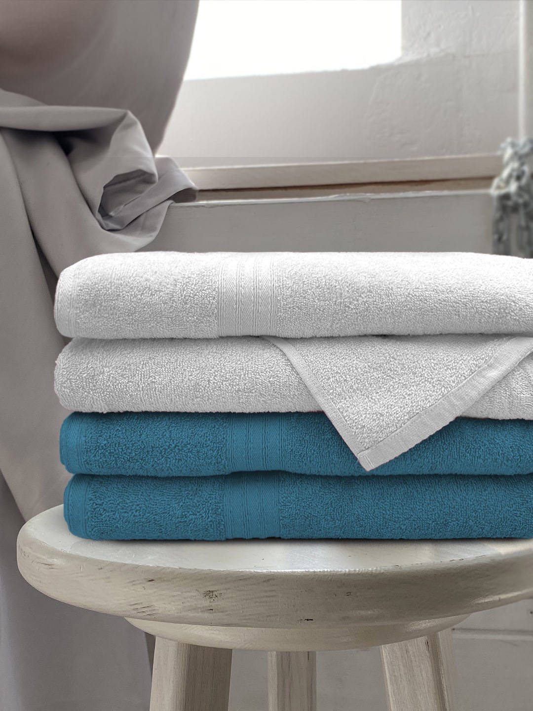 

Aura Pack Of 4 Solid 500 GSM Pure Cotton Bath Towels, Teal