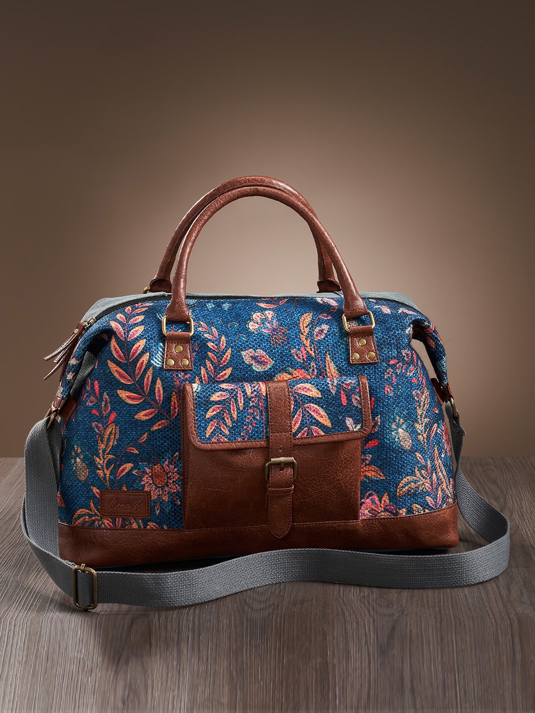 

Mona B Blue & Brown Large Duffel Bag with Outside Pocket and Stylish Design