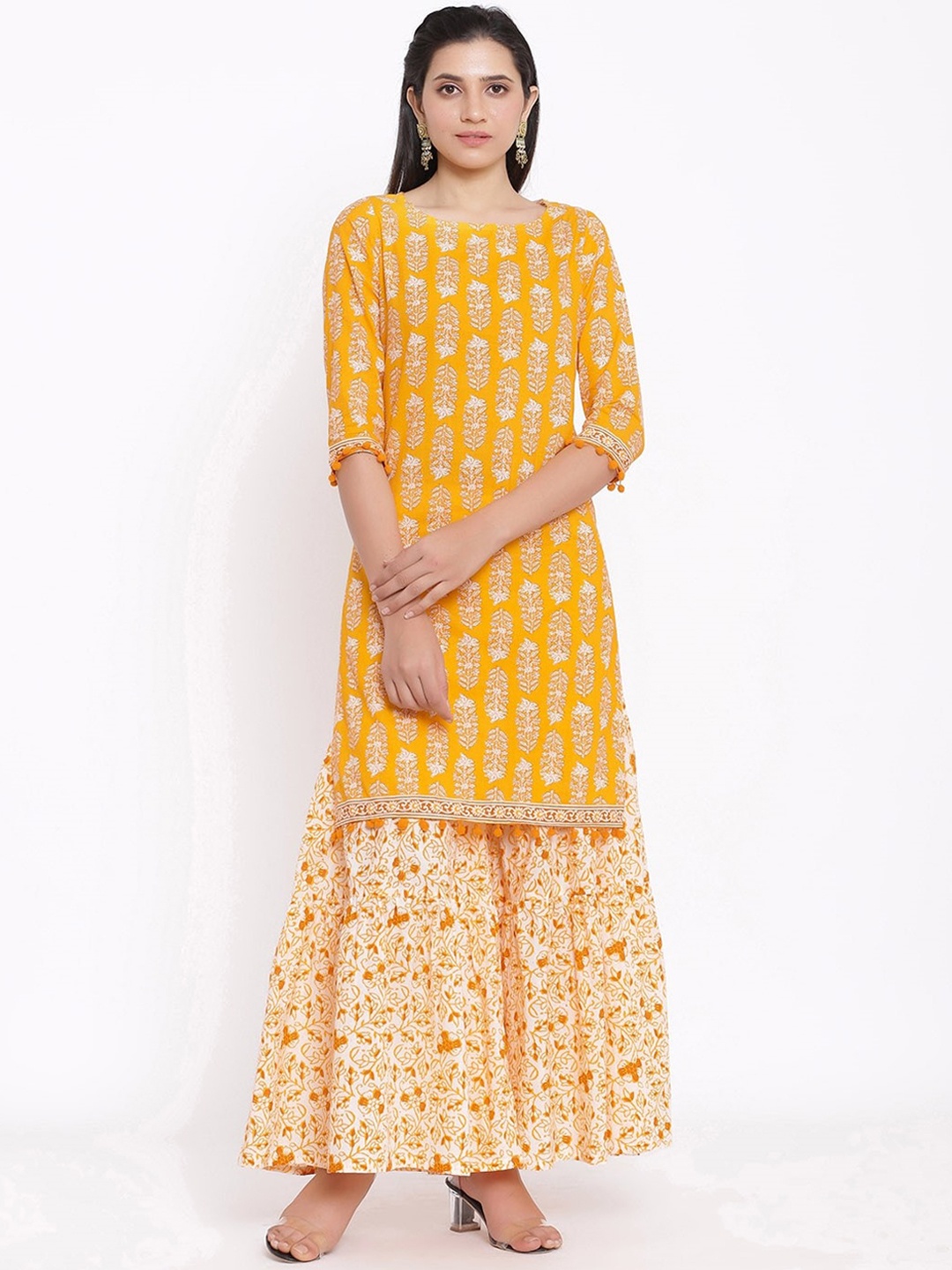 

Saart Bunaai Women Yellow Printed Regular Pure Cotton Kurti with Sharara & With Dupatta