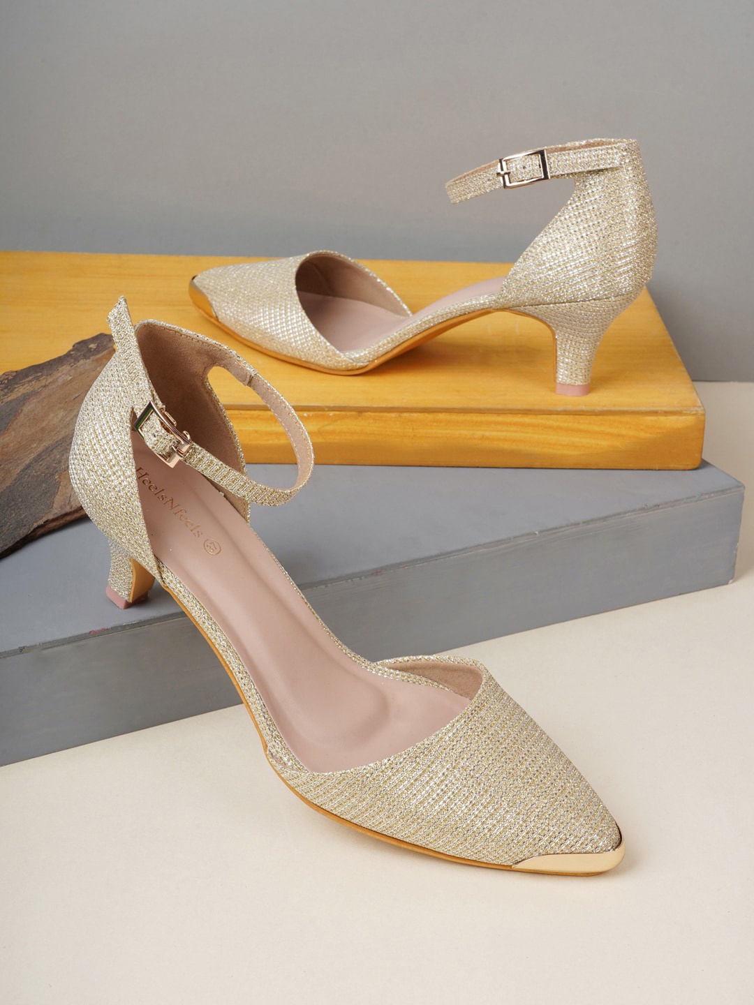 

HEELSNFEELS Gold-Toned Party Block Pumps