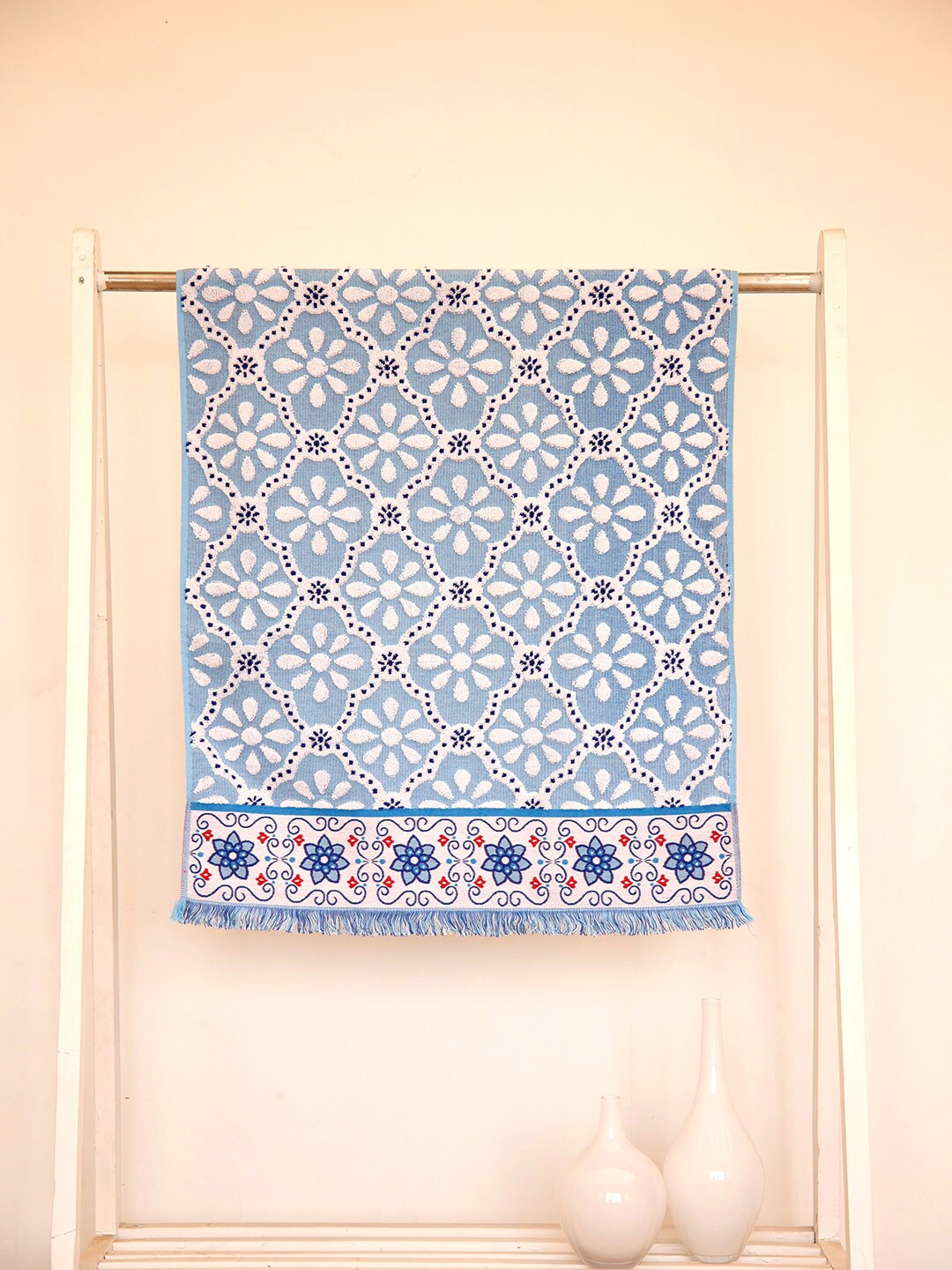 

Ariana Aqua-Blue & White Printed 670 GSM Cotton Reversible Bath Towel