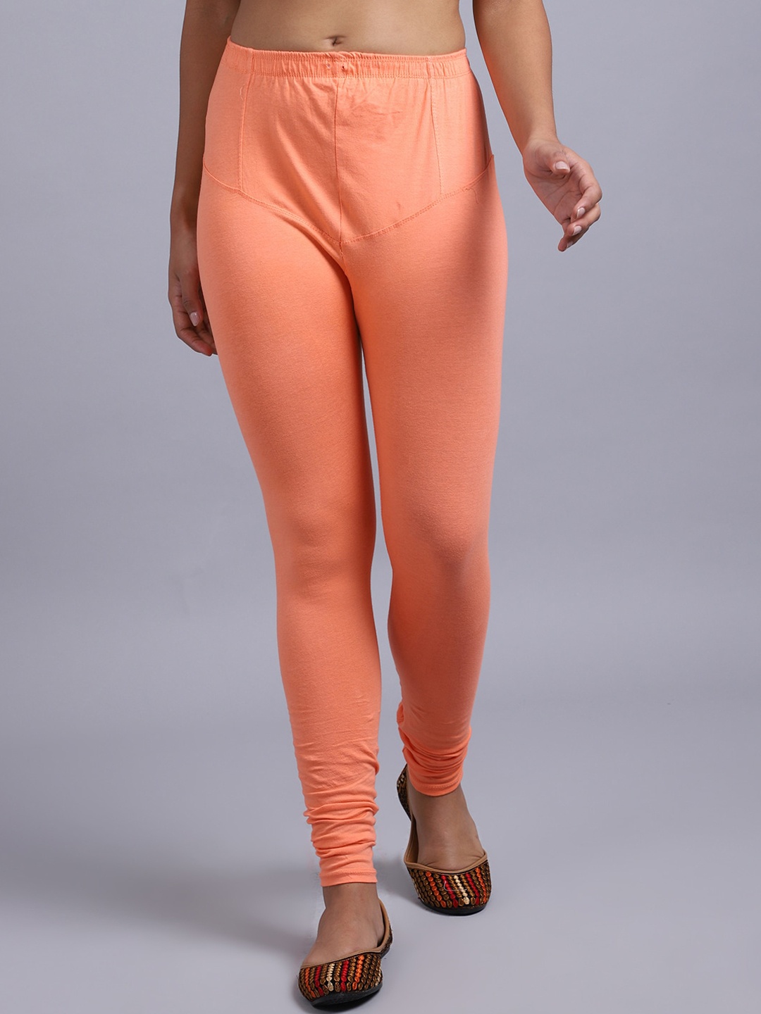 

GRACIT Women Peach-Colored Solid Ankle-Length Leggings