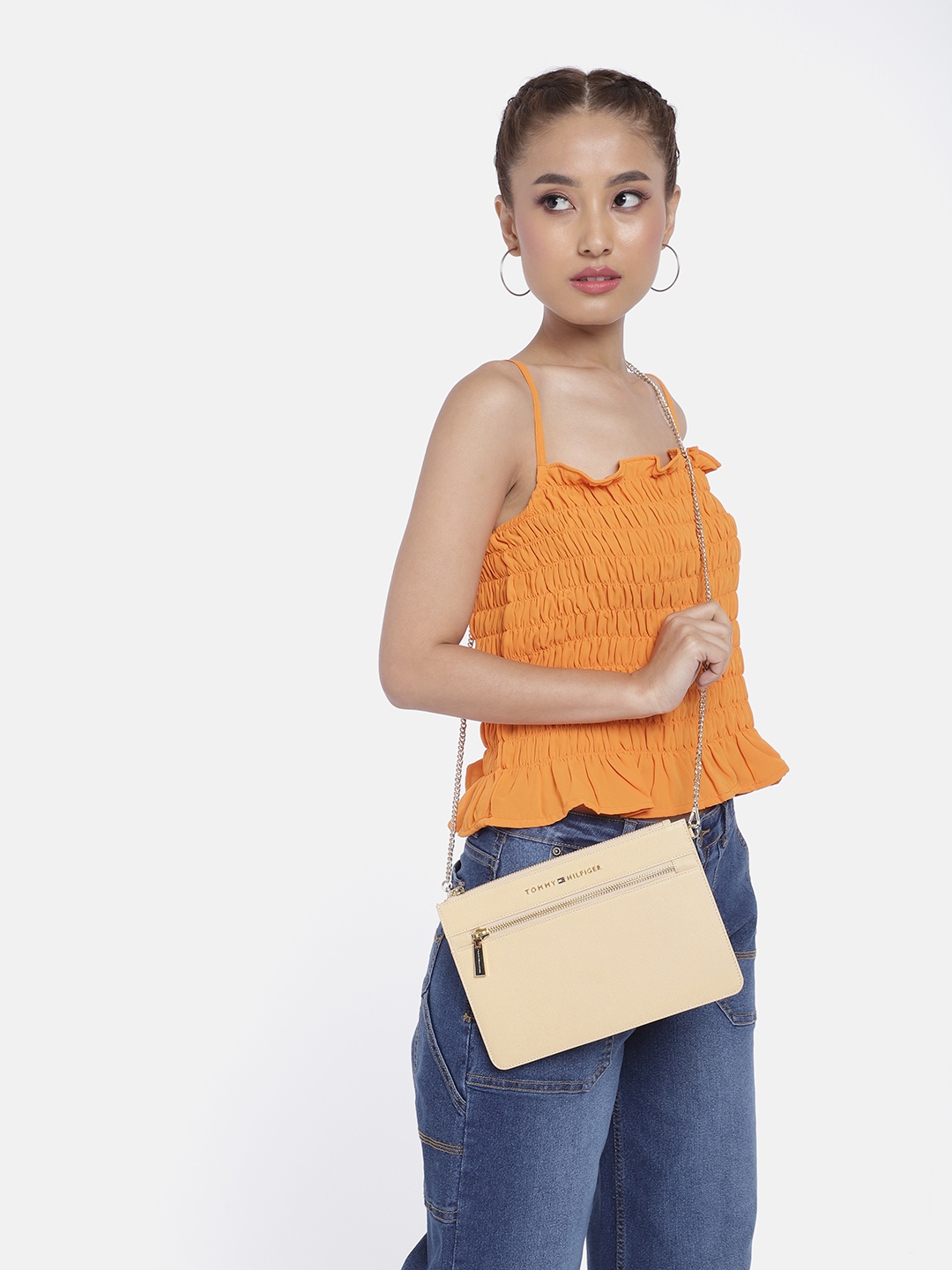 

Tommy Hilfiger Beige Textured Leather Regular Structured Sling Bag