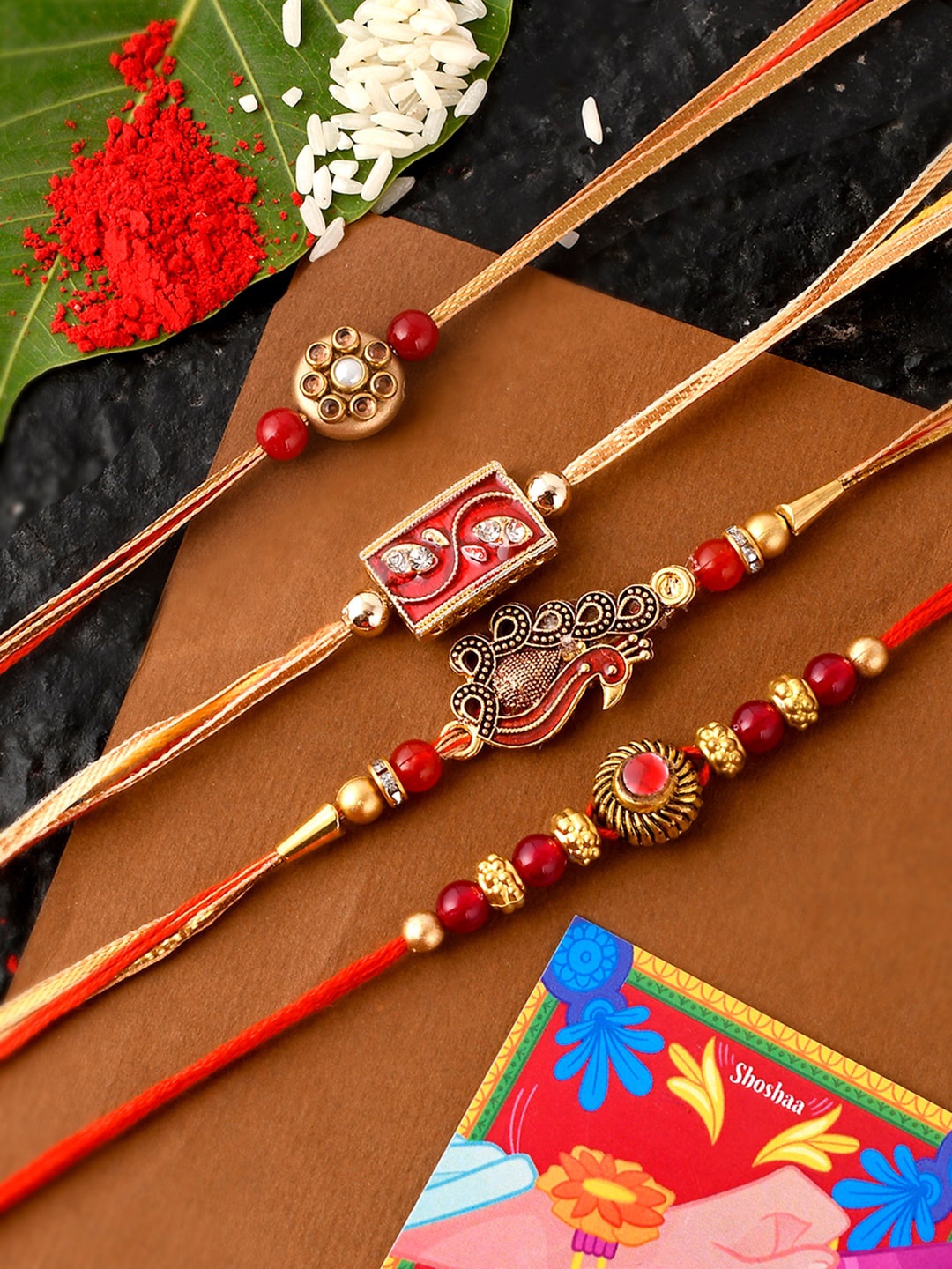 

Shoshaa Set of 4 Red & Yellow Beaded Handcrafted Rakhi With Roli Chawal