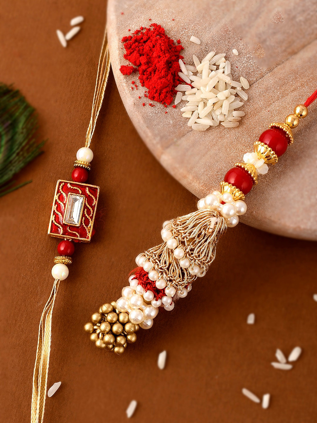 

Shoshaa Gold-Toned & Red Beaded Lumba Rakhi With Roli & Chawal