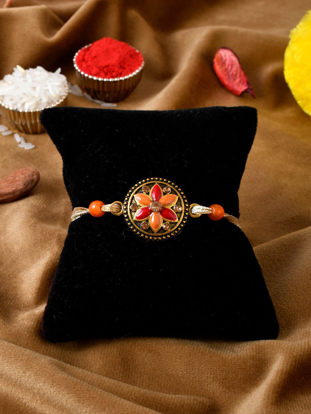 

Shoshaa Red & Orange Stone Flower Shaped Rakhi