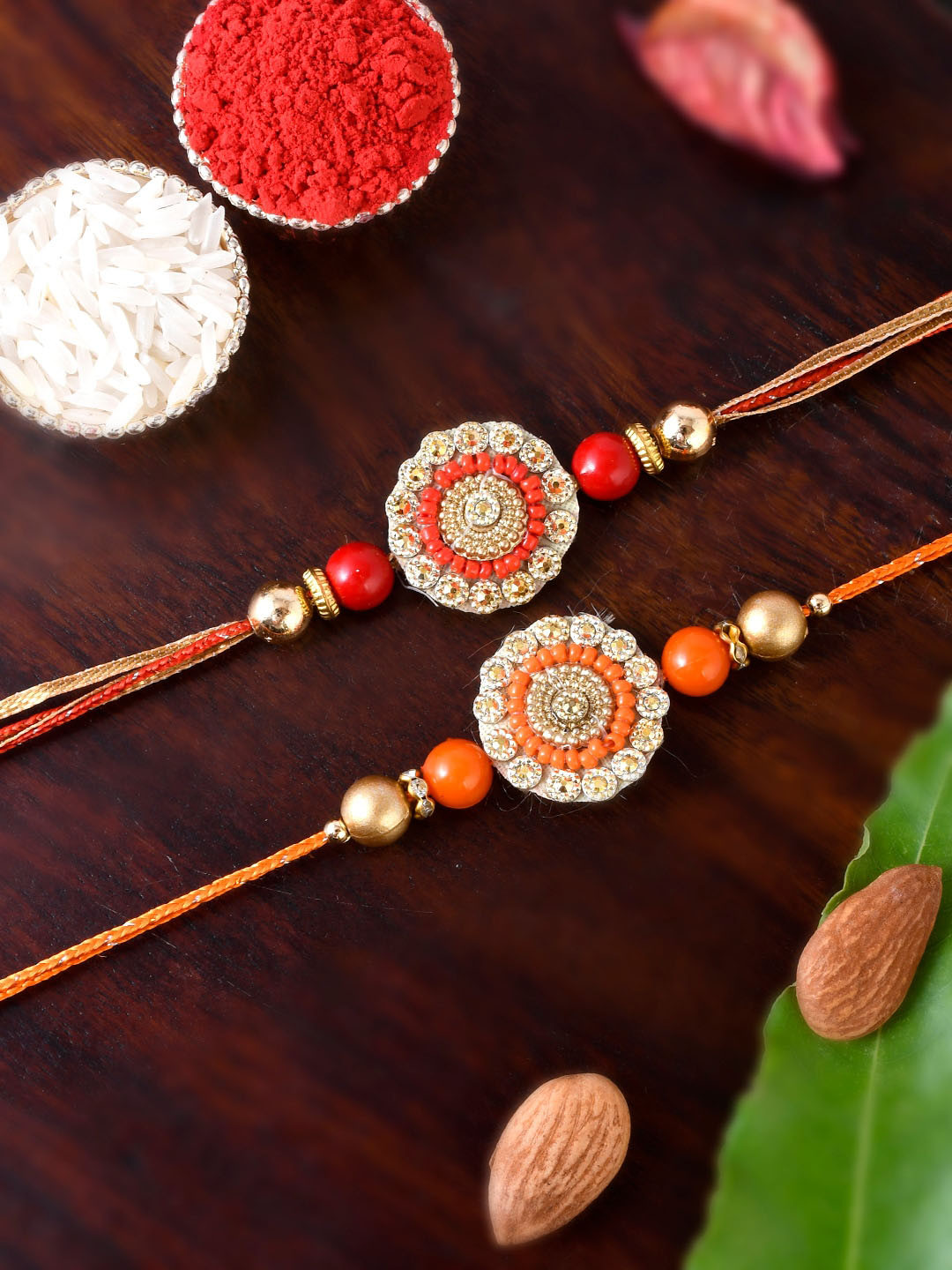

Shoshaa Gold-Toned Red & Orange Beads Single Bhai Rakhi
