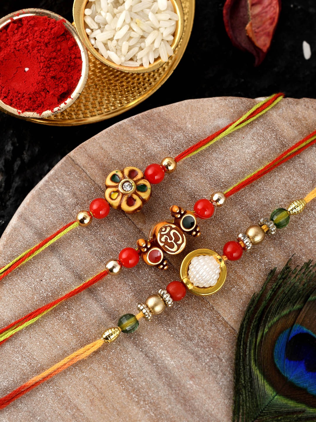 

Shoshaa Set of 3 Gold-Toned Red Beaded Handcrafted Combo Bhai Rakhi With Roli Chawal