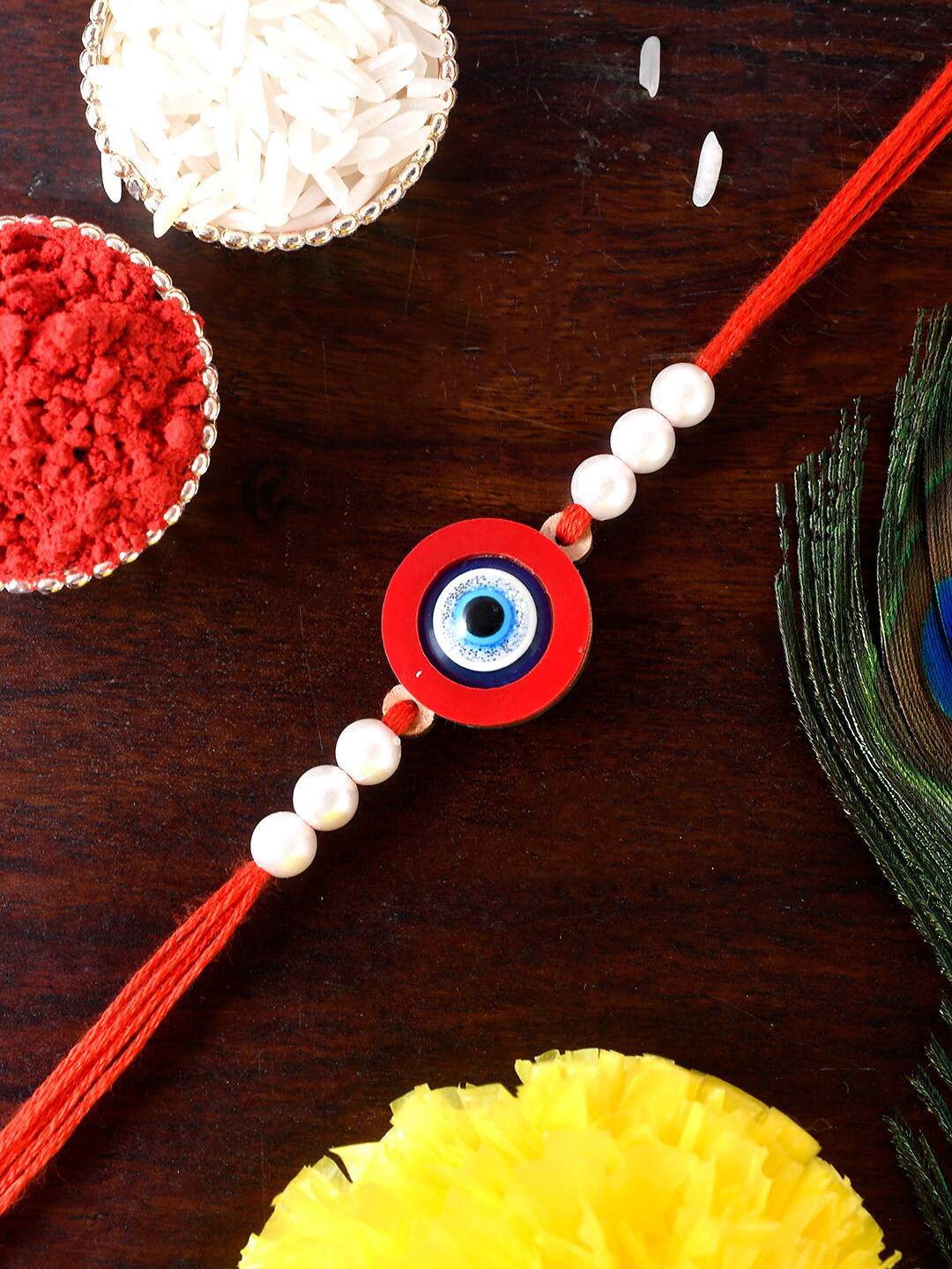 

Shoshaa Red & White Evil Eye Single Bhai Rakhi