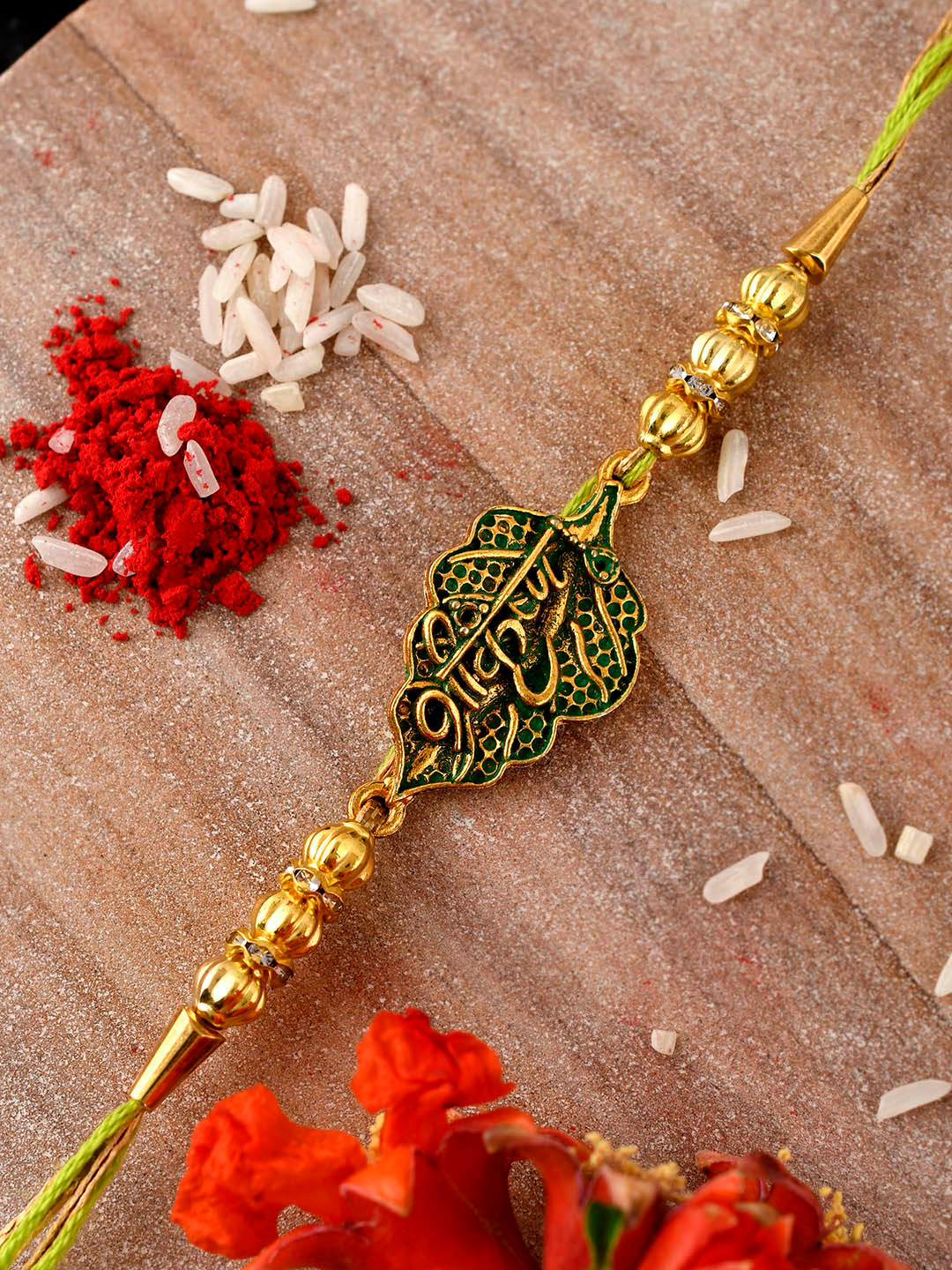 

Shoshaa Men Green Rakhi With Rolichawal