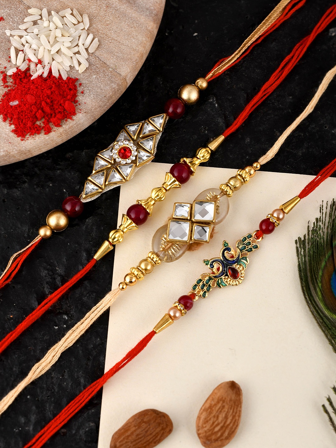 

Shoshaa Set of 4 Kundan Studded Peacock Shaped Combo Bhai Rakhi with Roli Chawal, Red