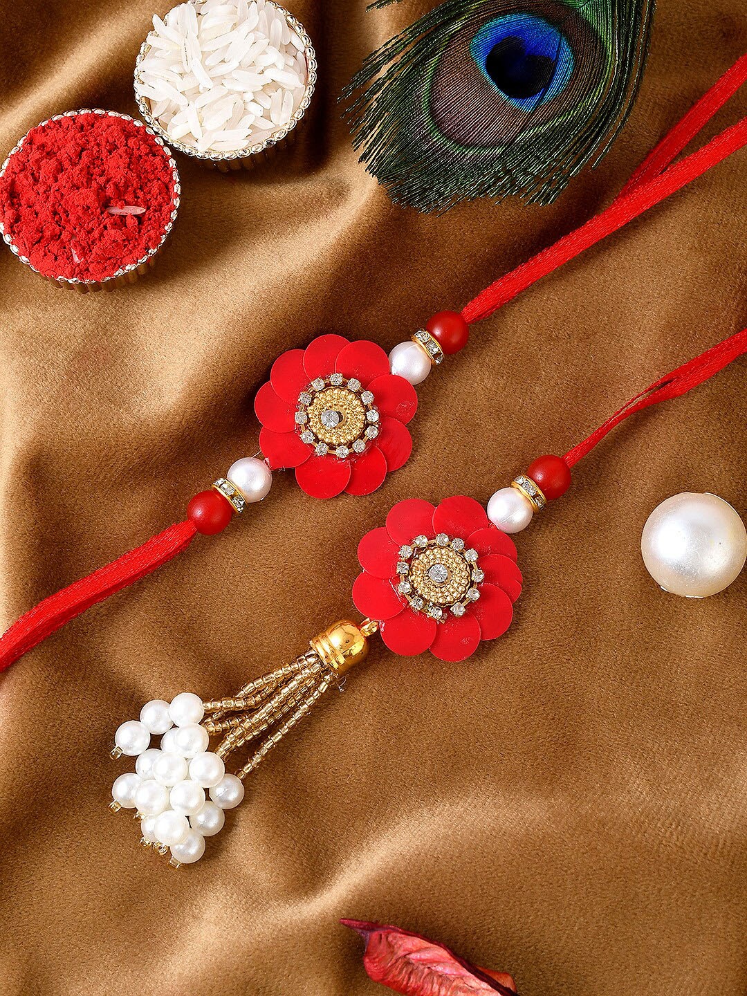 

Shoshaa Red & White Pearl & Beaded Lumba Bhai Bhabhi Rakhi
