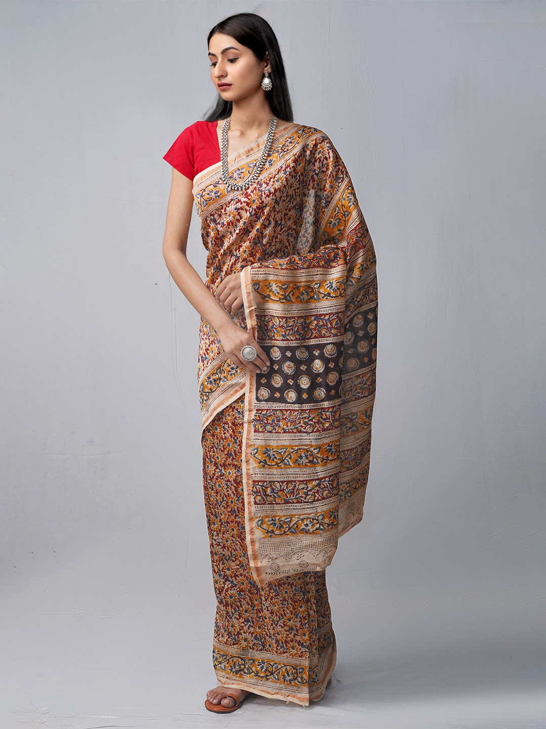 

Unnati Silks Brown & Black Kalamkari Silk Cotton Chanderi Saree
