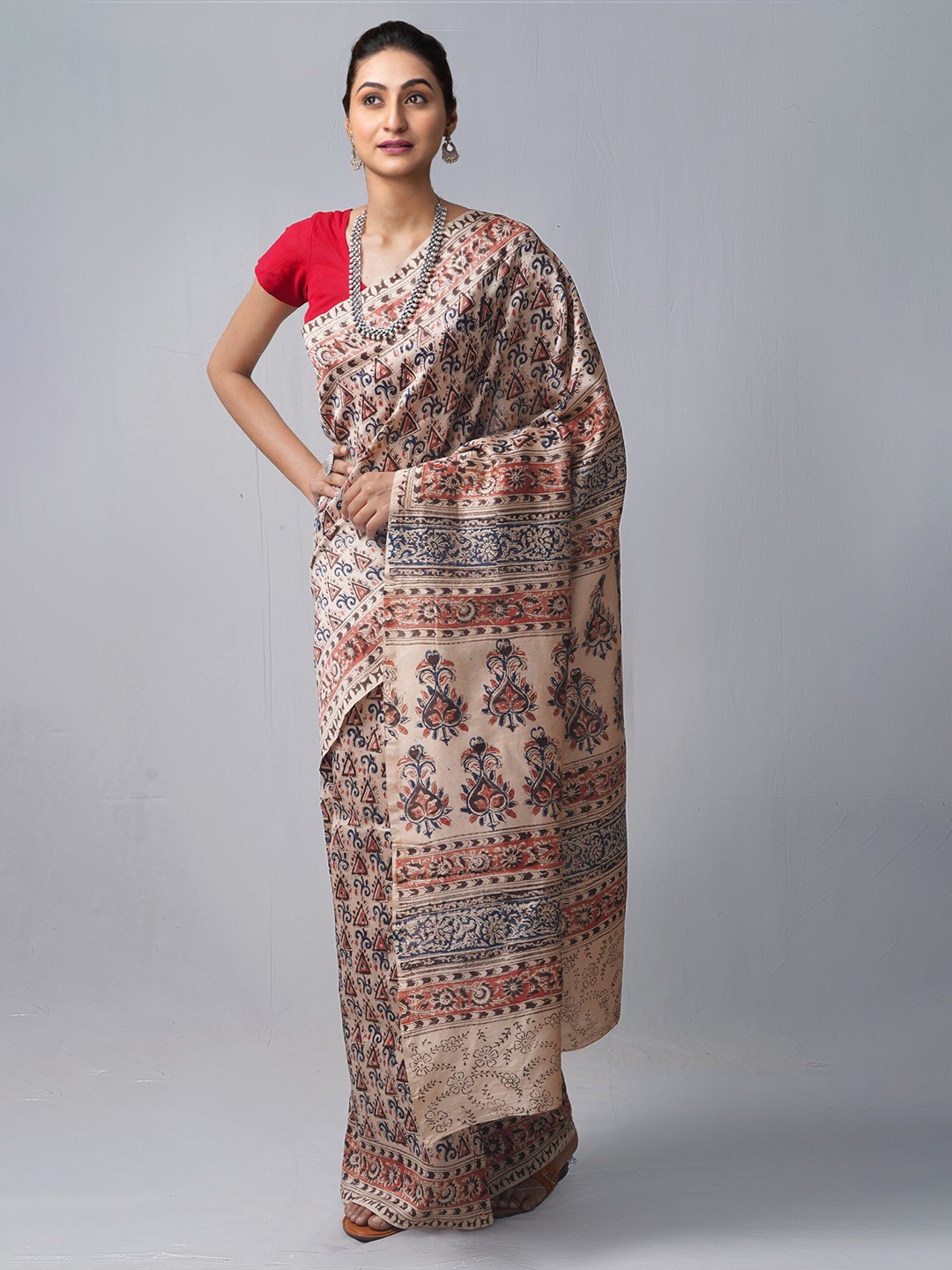 

Unnati Silks Beige & Blue Kalamkari Silk Cotton Chanderi Saree