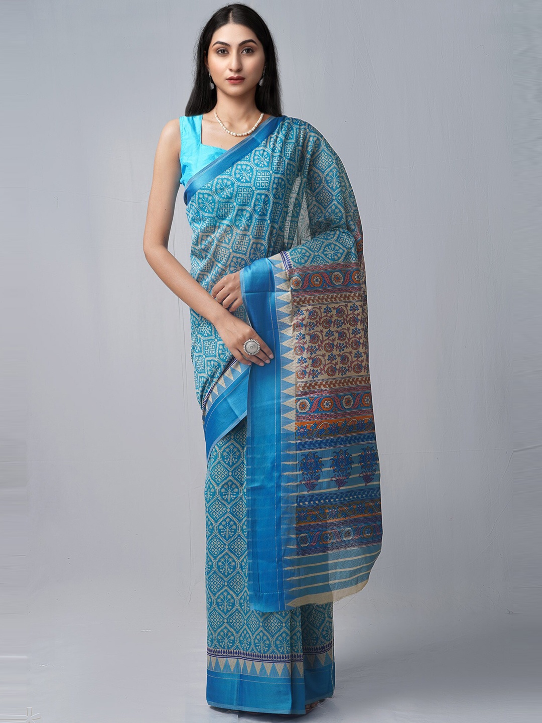 

Unnati Silks Blue & Orange Ethnic Motifs Silk Cotton Chanderi Saree