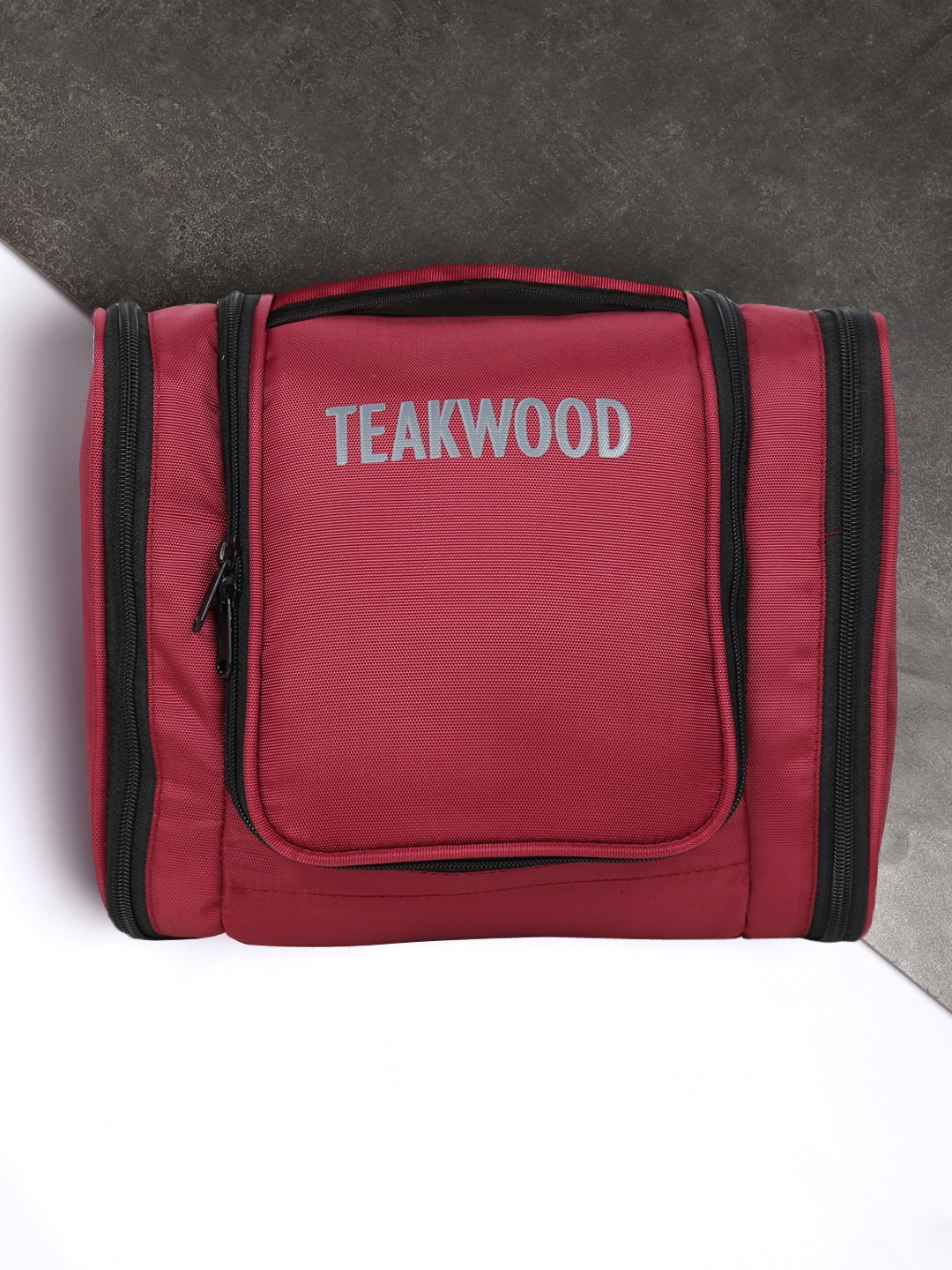 

Teakwood Leathers Red Printed Toiletry Kit