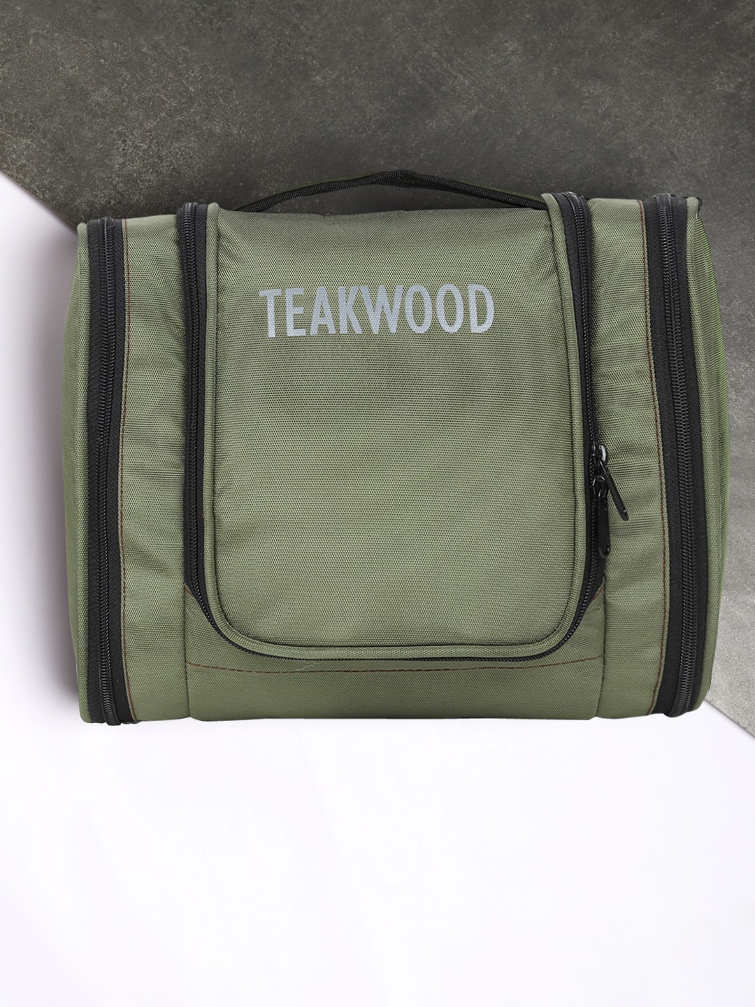 

Teakwood Leathers Green Printed Toiletry Kit