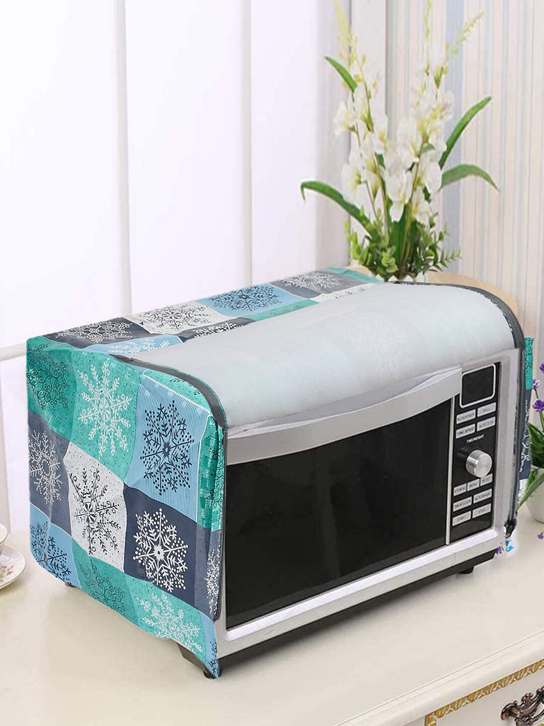 

Kuber Industries Blue & Green Floral Printed Microwave Oven Cover-25 Ltr