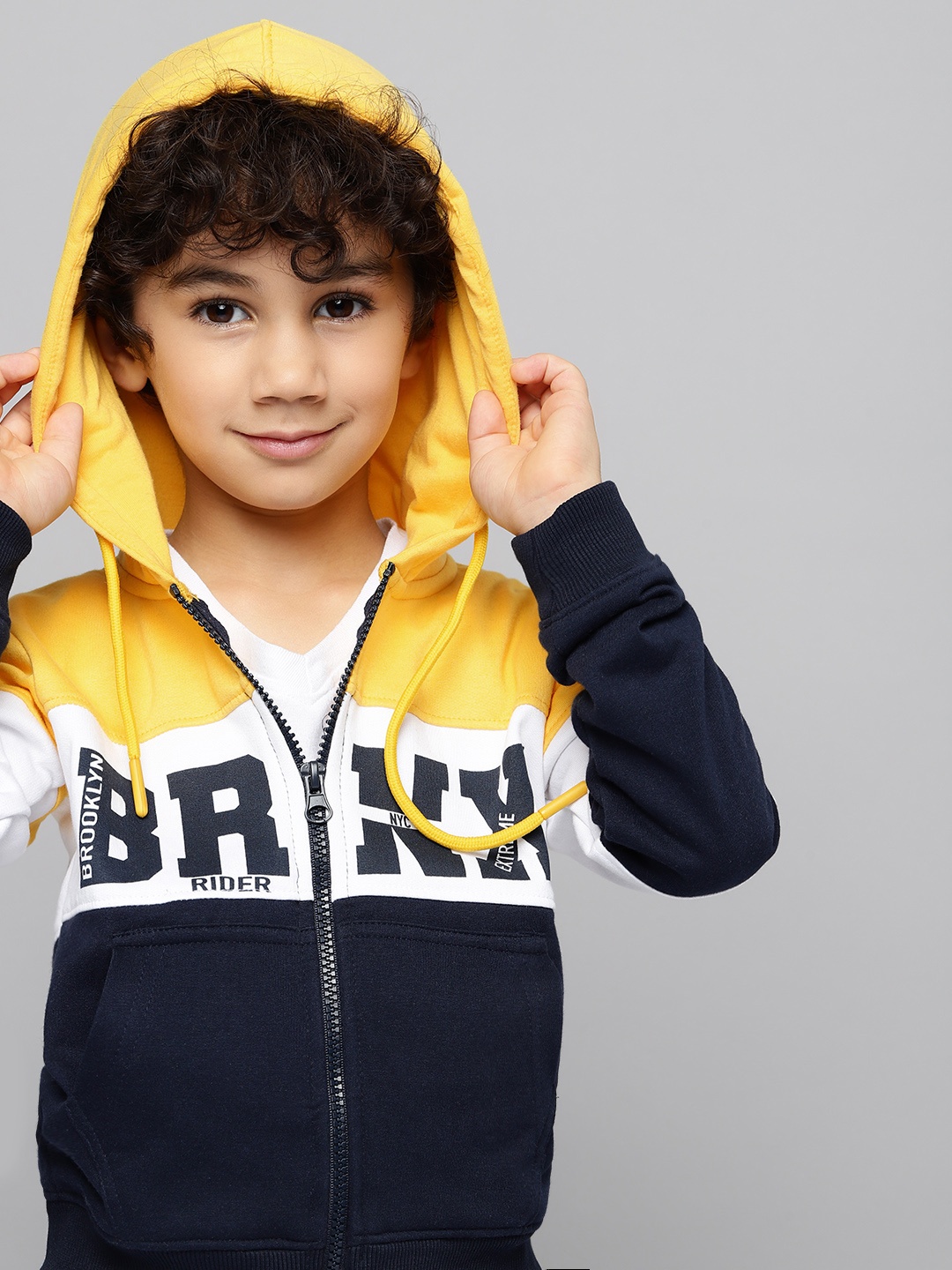 

HERE&NOW Boys Navy Blue & Yellow Colourblocked & Printed Hooded Sweatshirt
