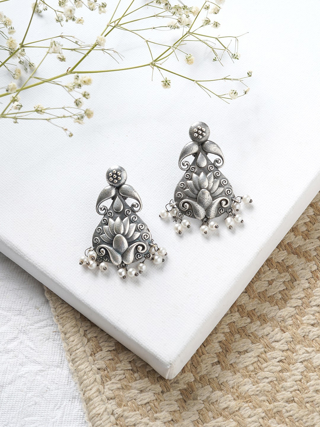 

TEEJH Silver-Toned Contemporary Drop Earrings