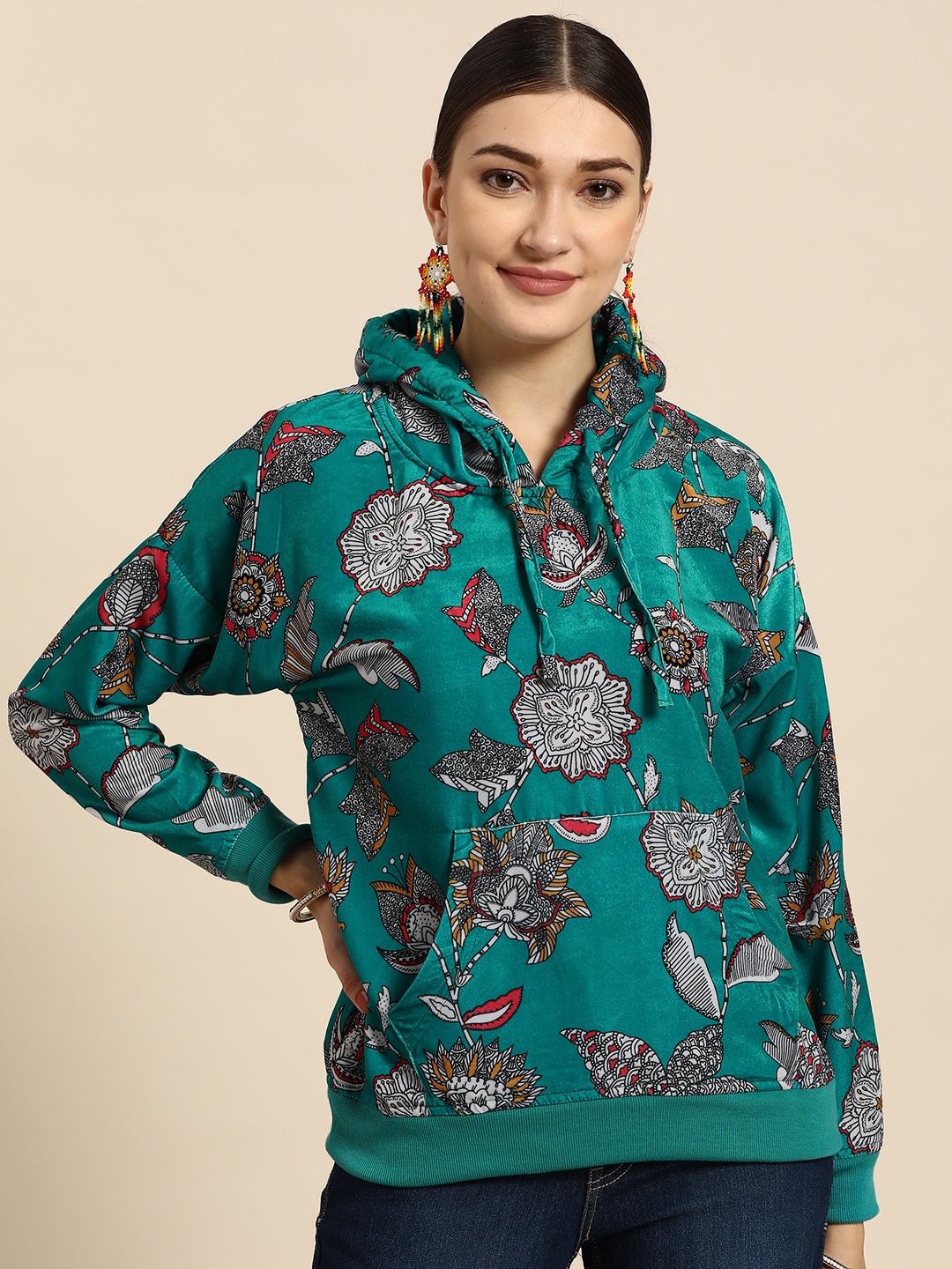 

Sangria Women Teal Green & White Ethnic Motifs Printed Hooded Sweatshirt