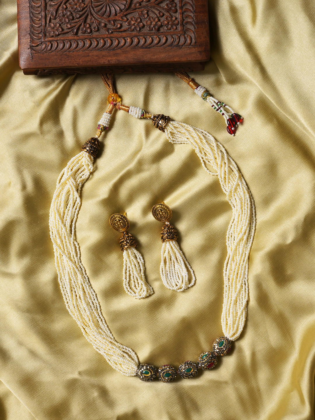 

SOHI Silver-Plated Cream Coloured & Red Stone Studded Jewellery Set