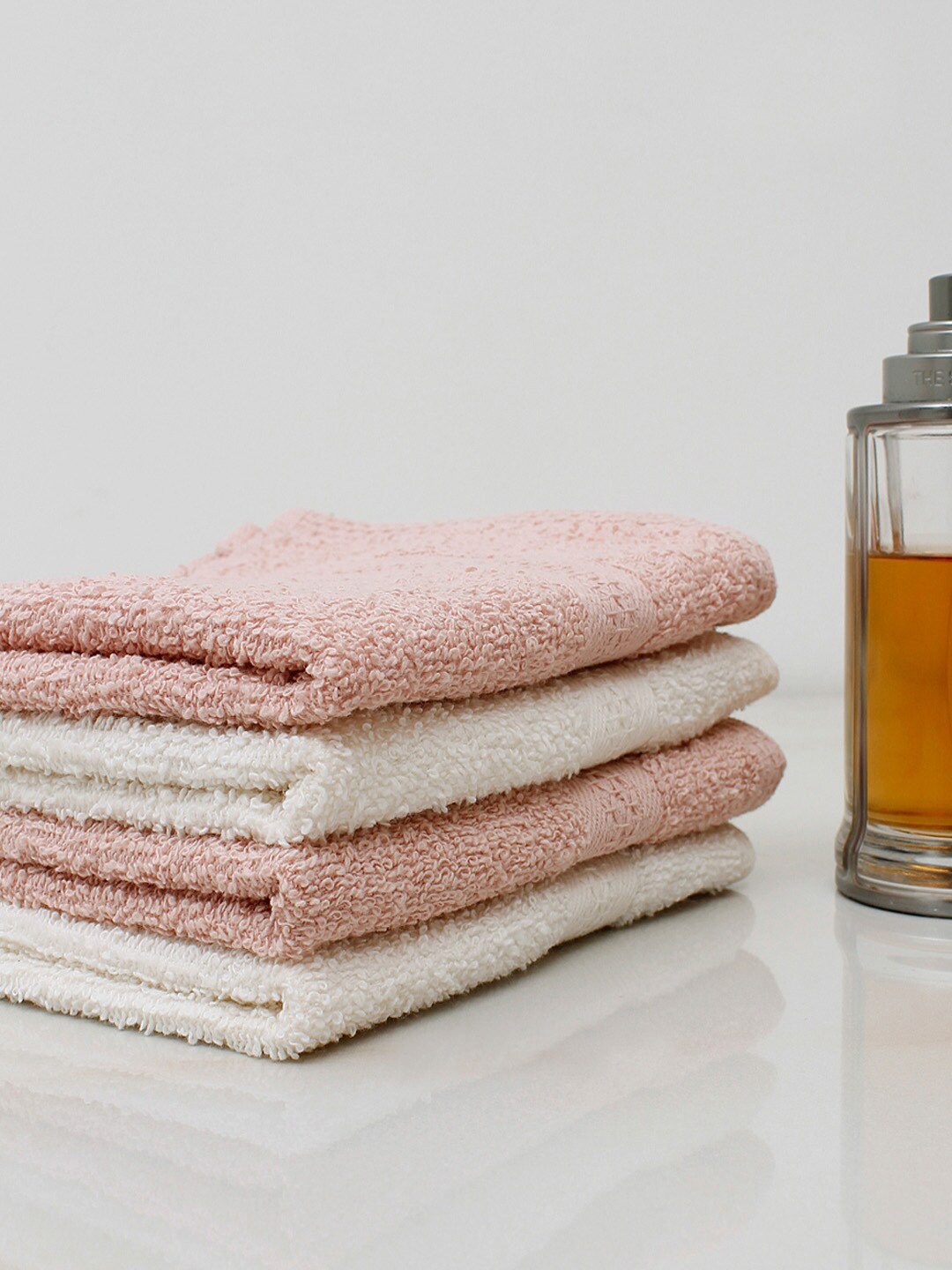 

AVI Living Set Of 4 Solid Anti-Microbial 450 GSM Cotton Face Towels, Cream