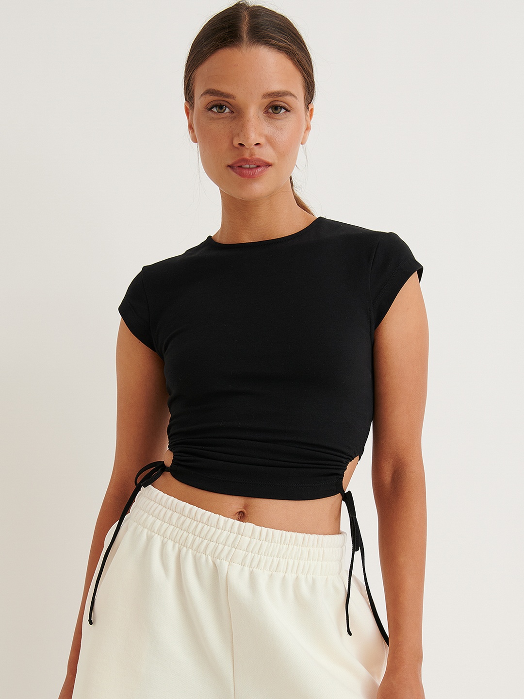 

NA-KD Women Black Solid Cotton Crop Fitted Top with Tie-Ups & Ruched Detail