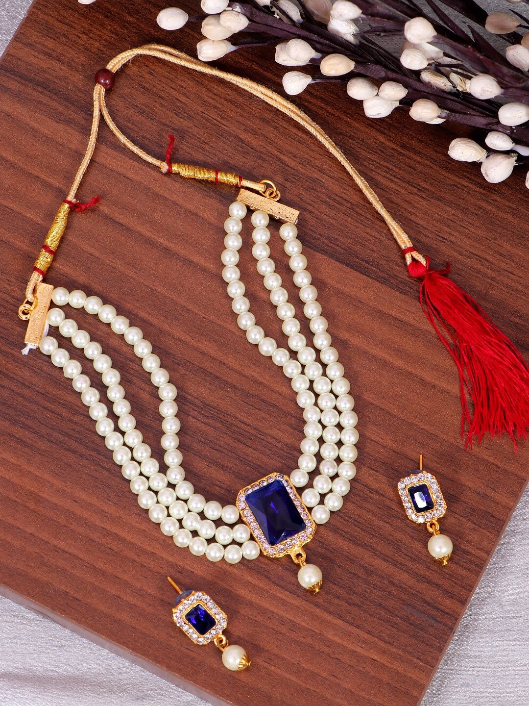 

Crunchy Fashion Gold-Plated Blue Stone-Studded & Pearl Beaded Choker Jewellery Set