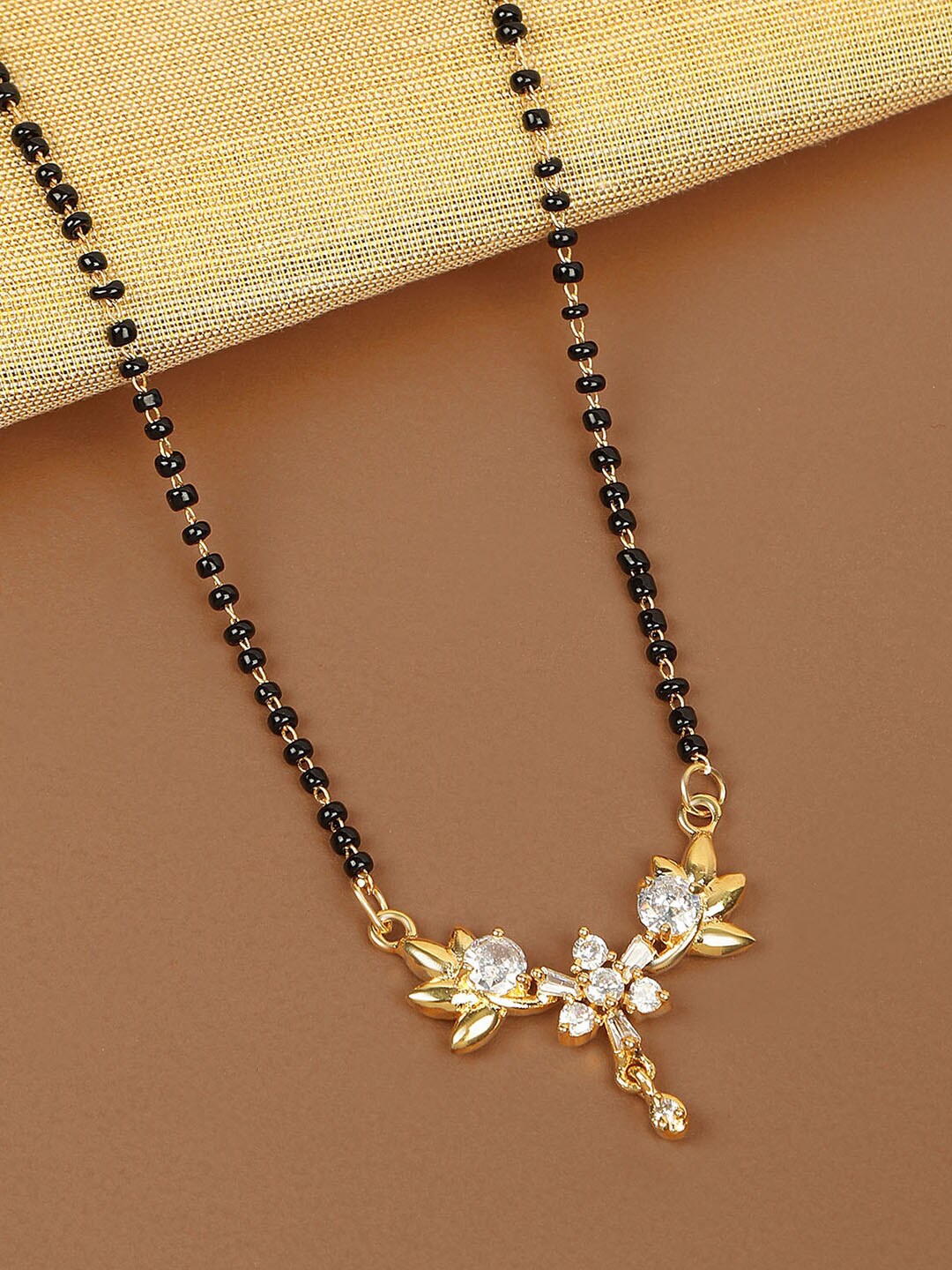 

AccessHer Gold-Plated White Stone-Studded & Black Beaded Mangalsutra