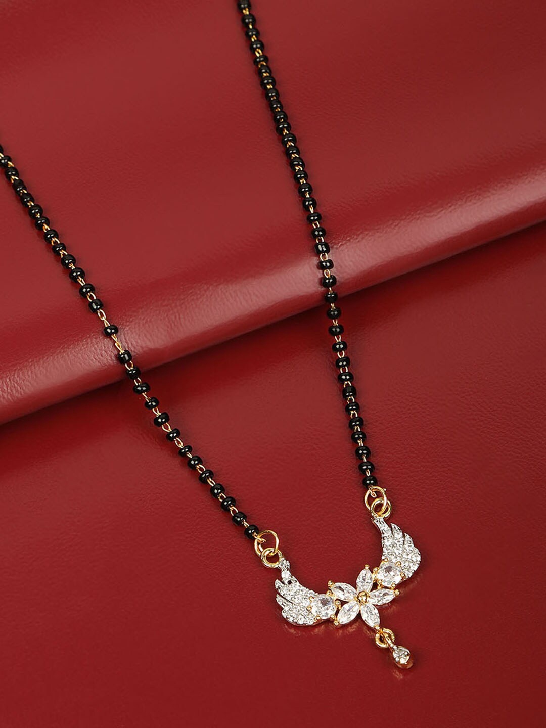 

AccessHer Gold-Plated Black Beaded White AD-Stone Studded Mangalsutra