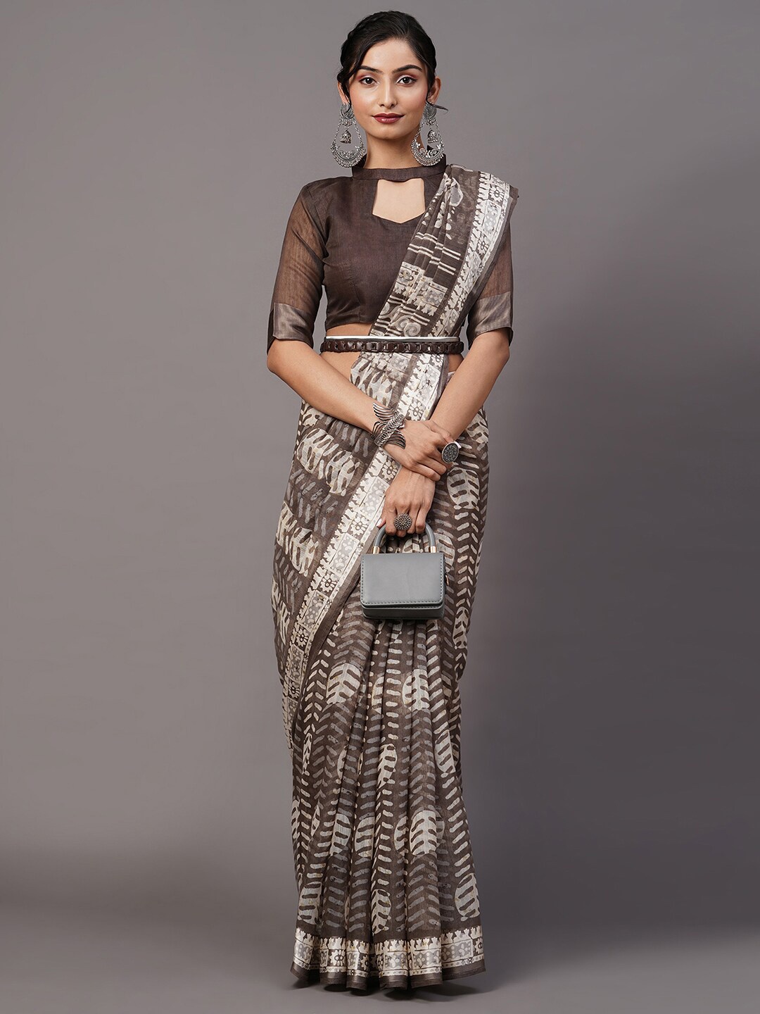 

Mitera Charcoal & Gold-Toned Ethnic Motifs Ikat Saree