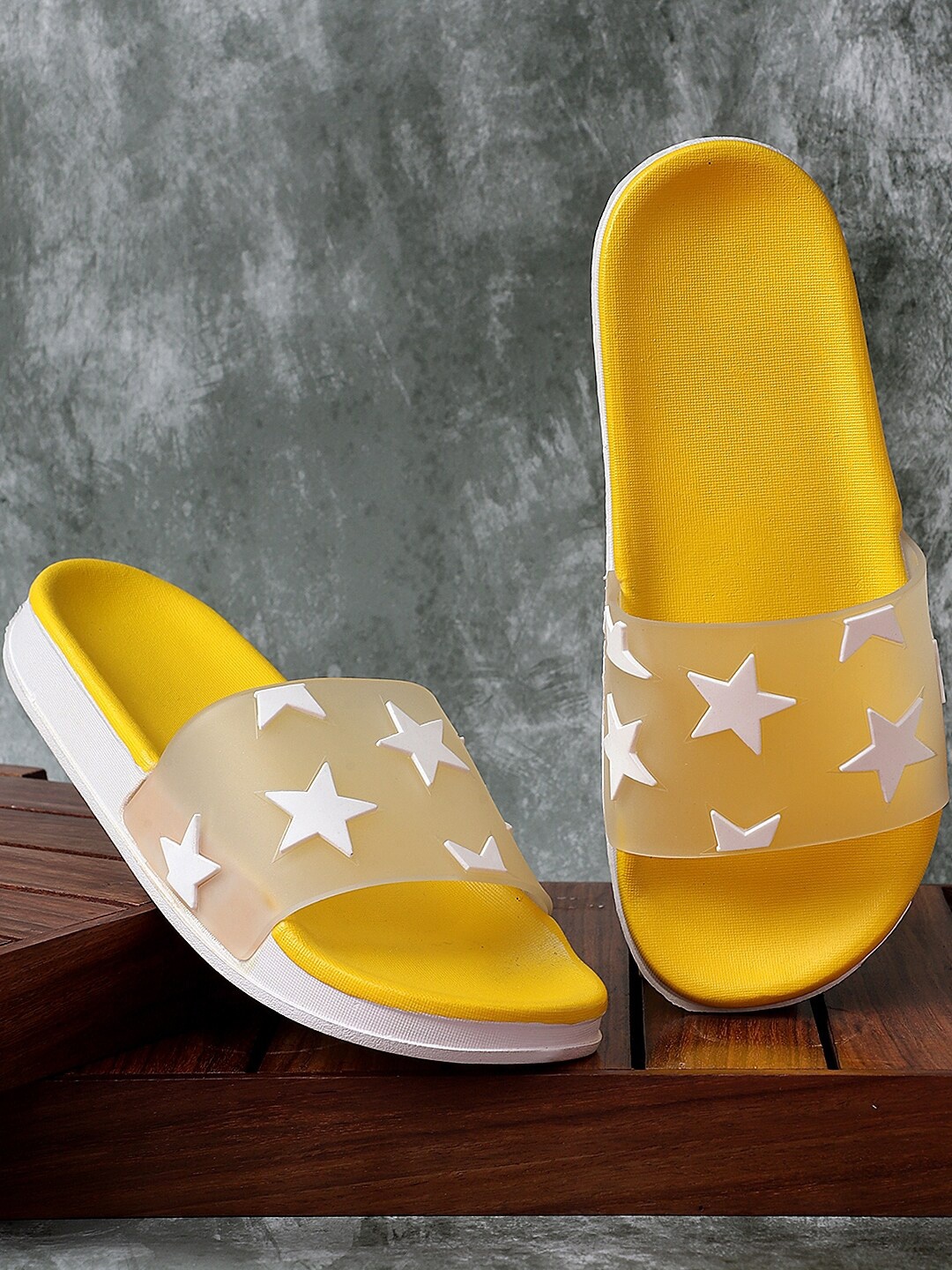 

Pampy Angel Women Yellow & White Printed Rubber Sliders