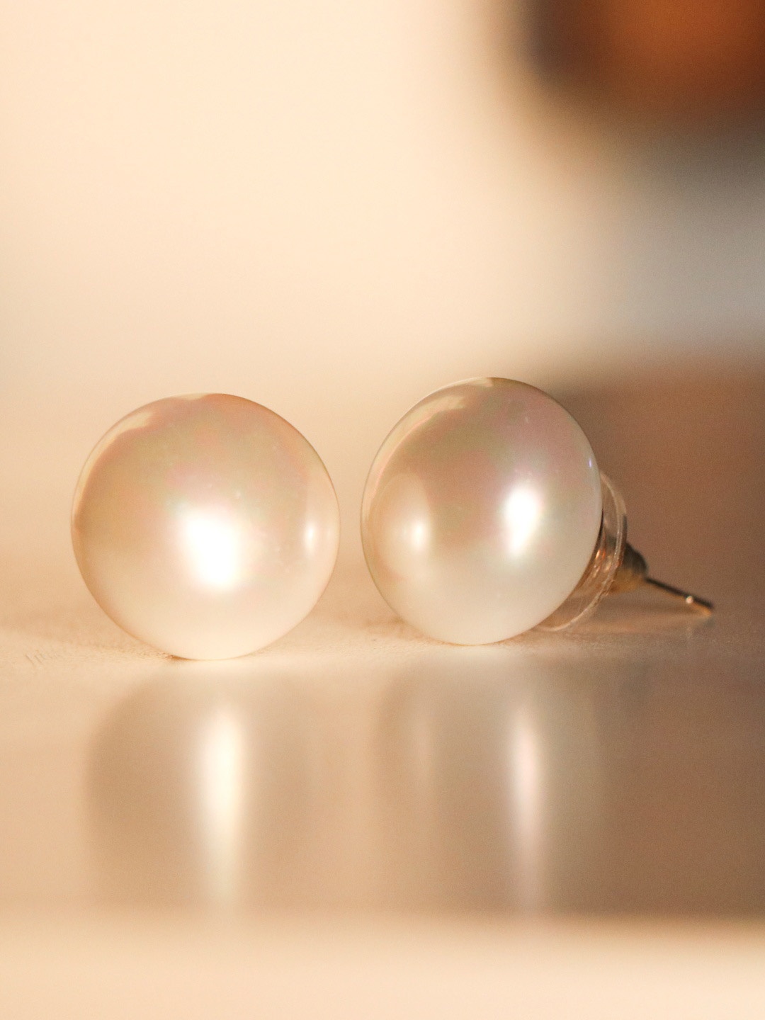 

Ishhaara White Circular Pearl Studs Earrings