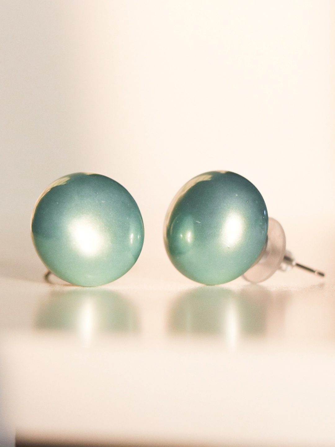 

Ishhaara Blue Oval Studs Earrings