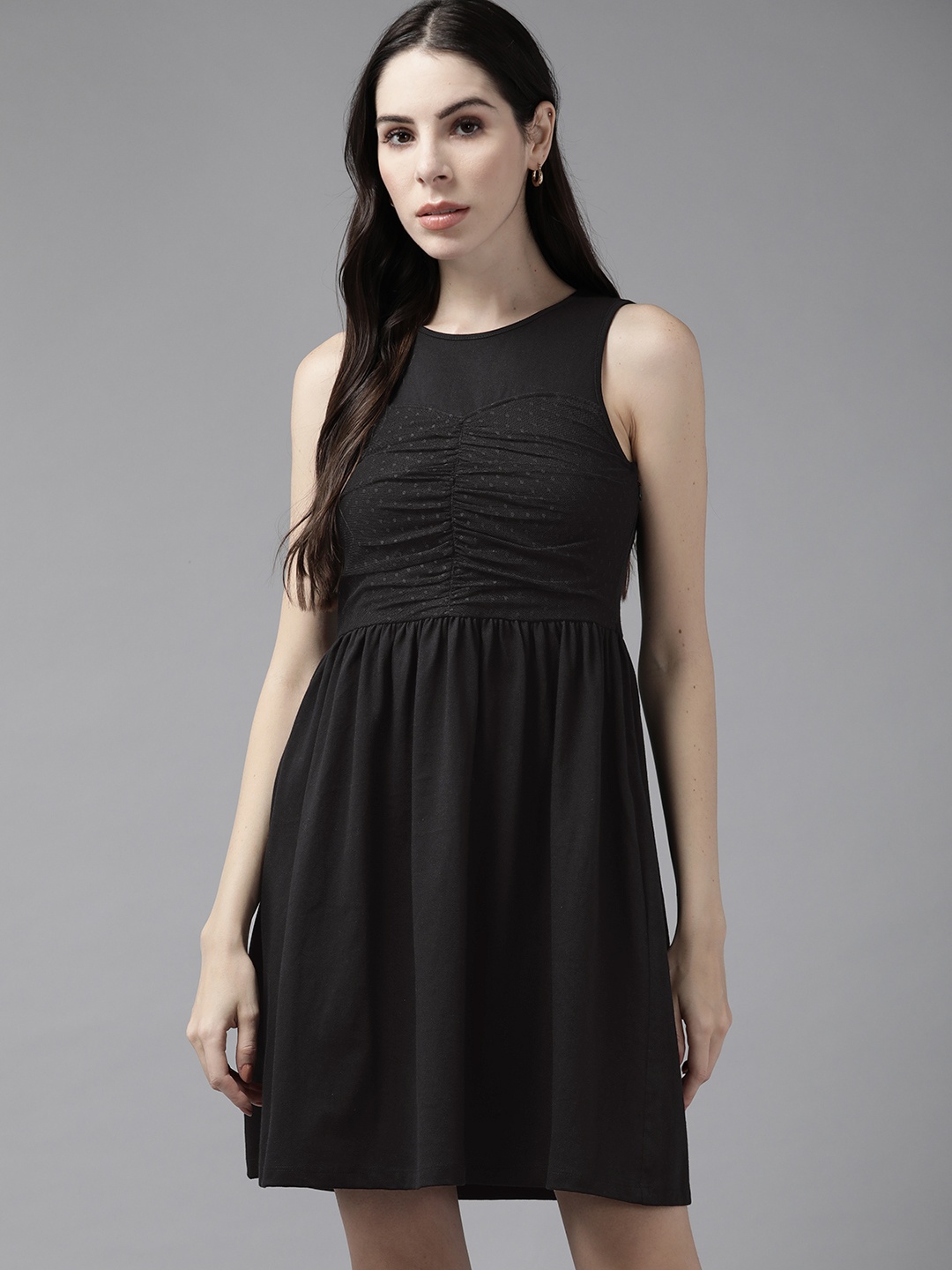 

The Roadster Lifestyle Co. Black Solid Mesh Detail A-Line Dress