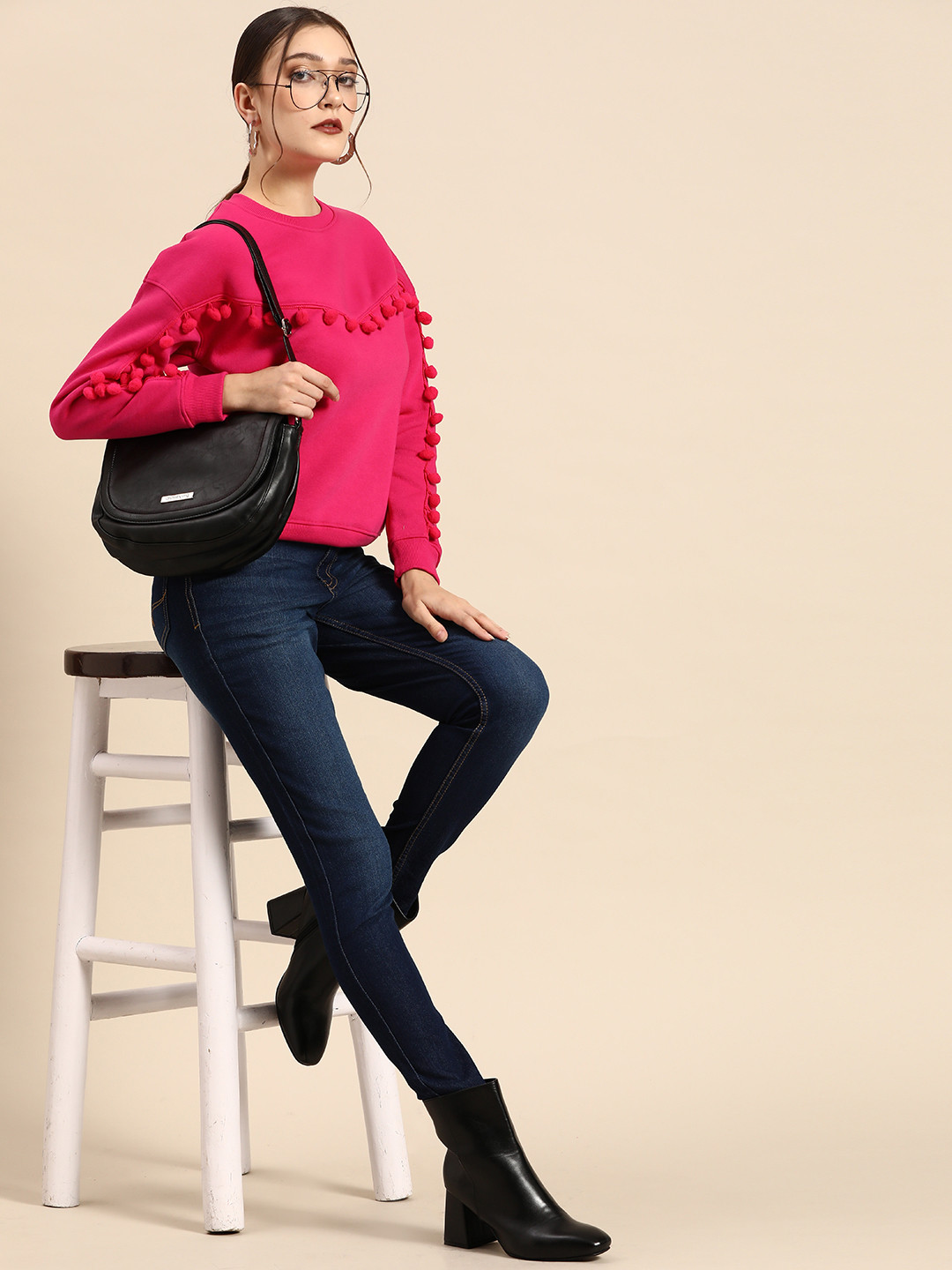 

Sangria Women Pink Solid With Pom Pom Sweatshirt