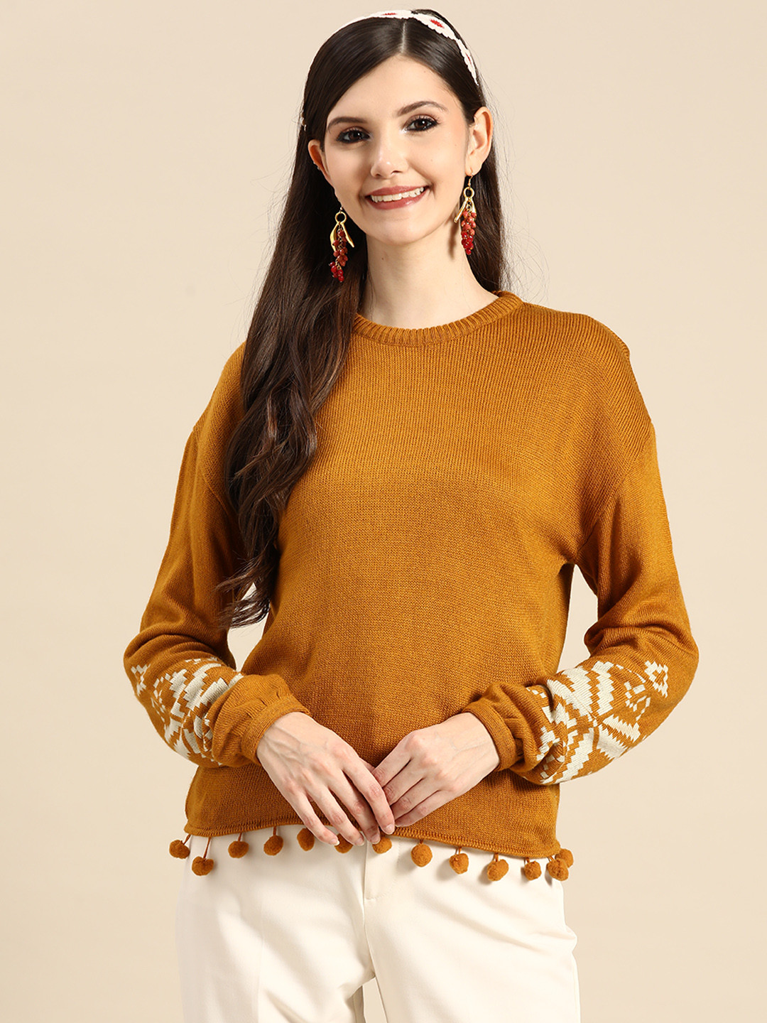

Sangria Women Mustard Yellow Solid Pom-Pom Hem Pullover